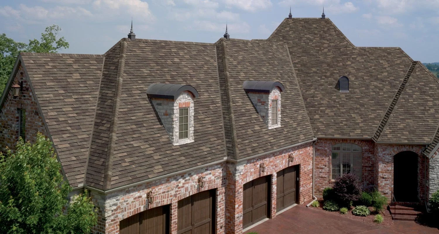 TAMKO Woodgate Weathered Wood roof with wide-cut wood shake style