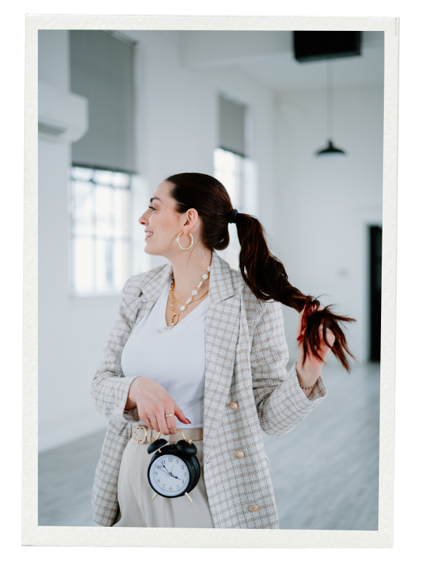 Taleesa holding a clock
