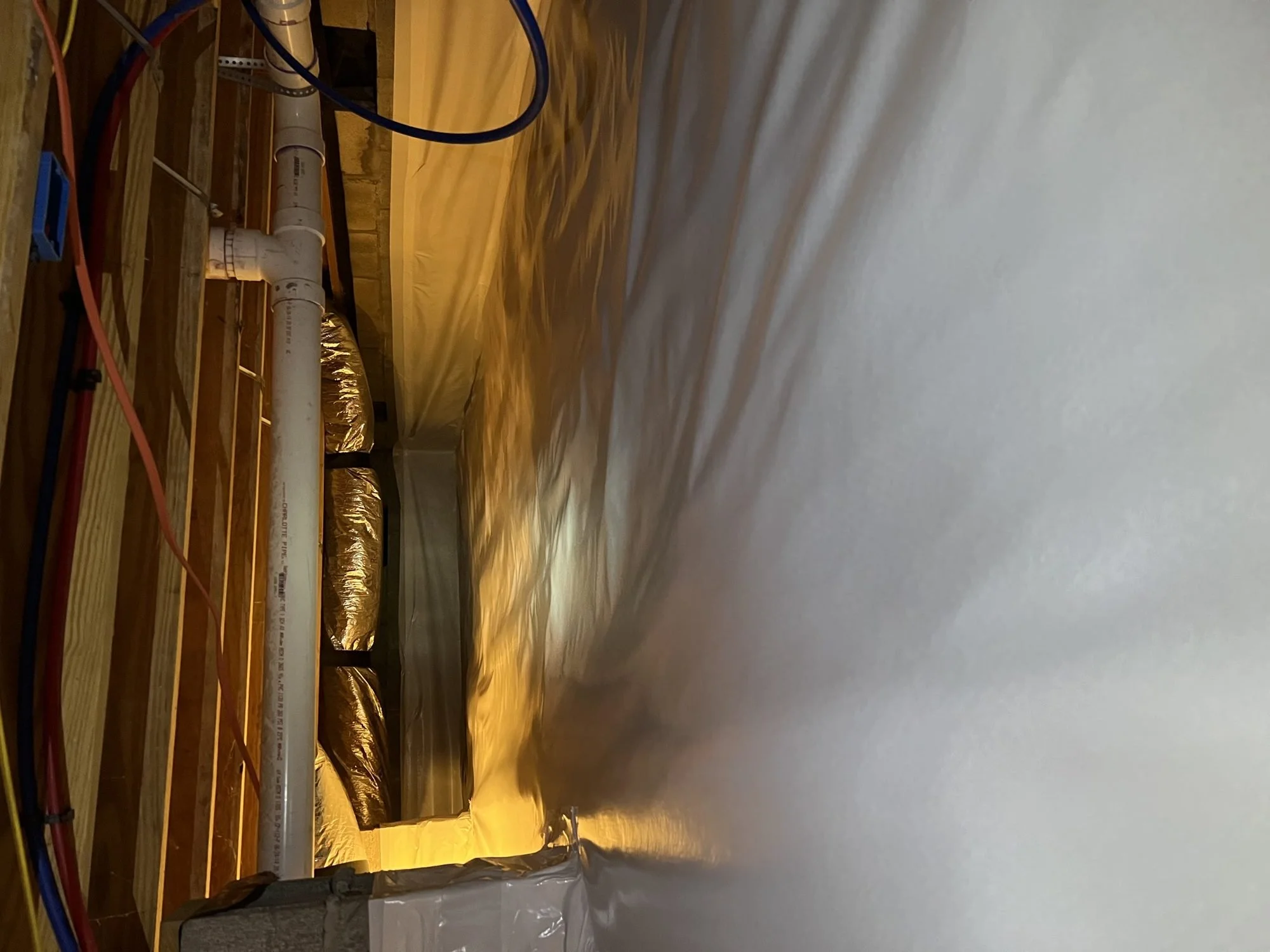 Wall liner and insulated ductwork in an encapsulated Middle Tennessee crawl space