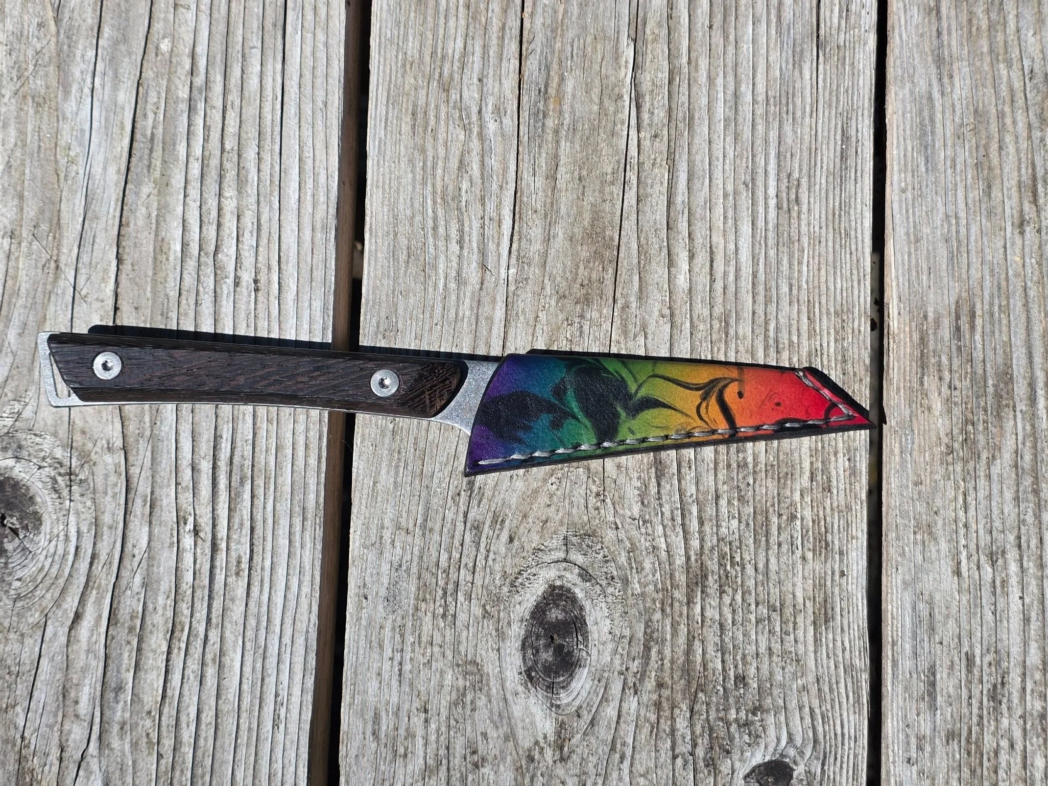 My Mini 4.5" paring knife, with a full rainbow fade, and black marbling over-top.
