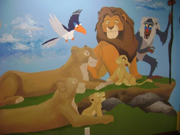 A mural featuring characters from The Lion King, including lions, a monkey, and a bird flying above a grassy landscape with rocks.