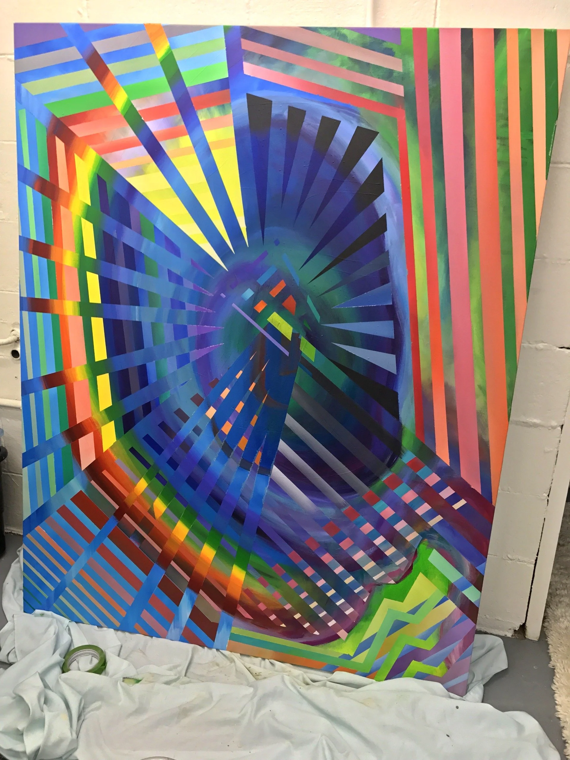 Abstract geometric painting with multicolored lines and shapes creating a spiral or tunnel effect on a canvas.