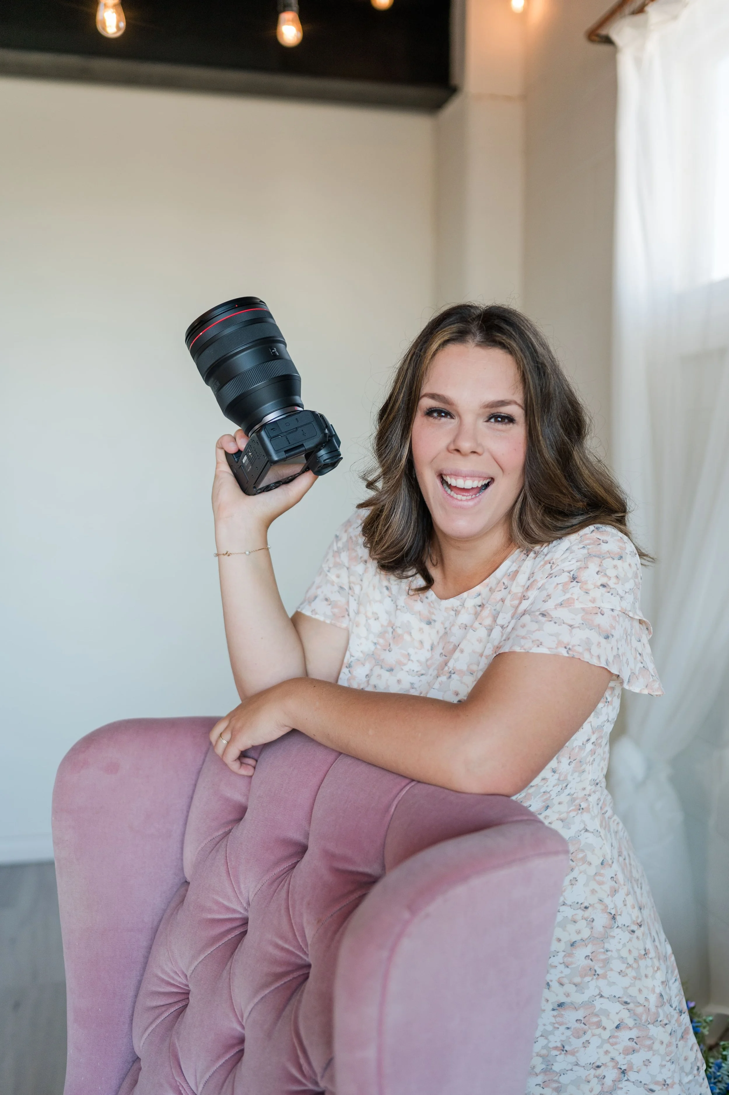 Branding session of Audrey Photography laughing at the camera