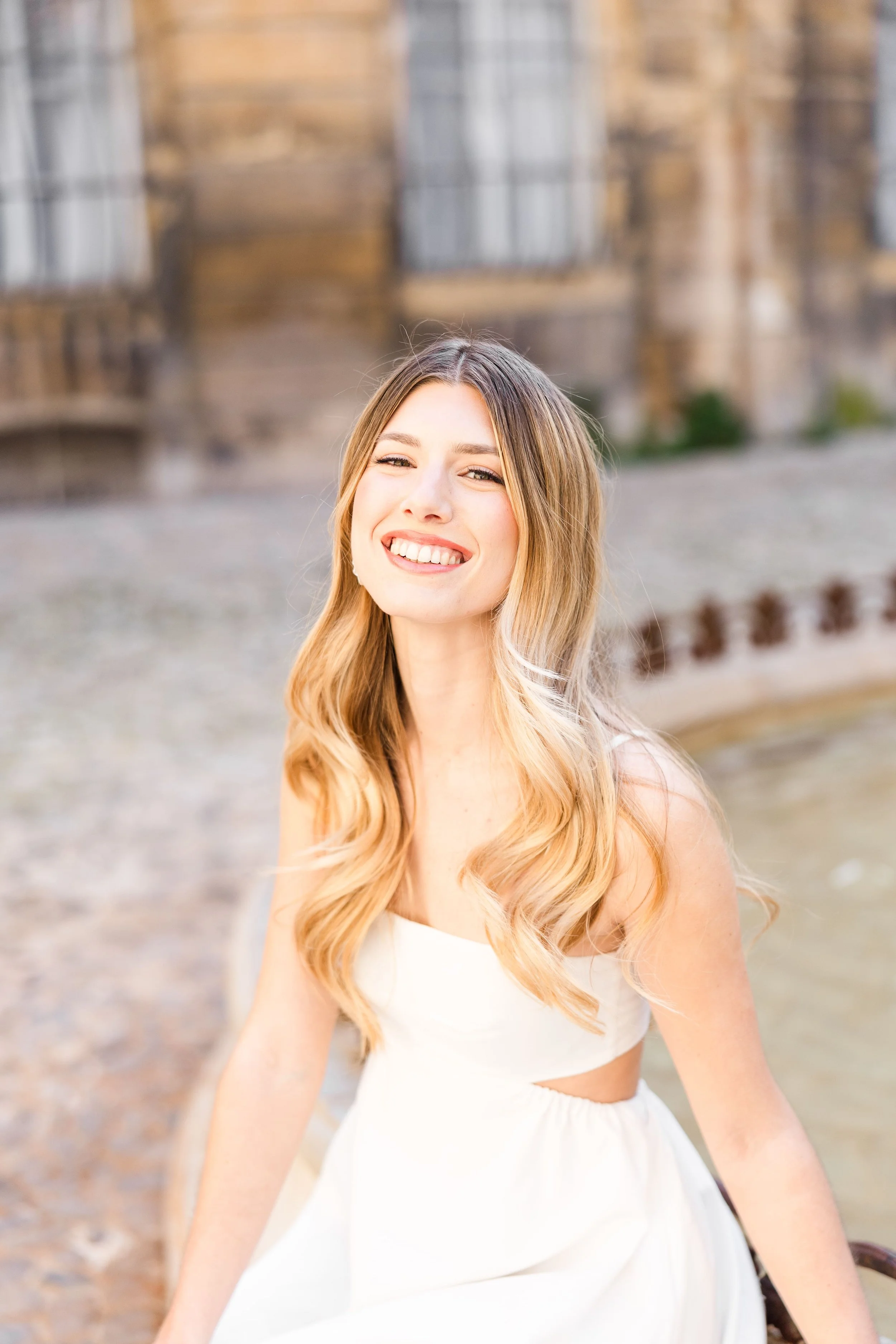 Woman photographed with soft urban textures in Aix city center