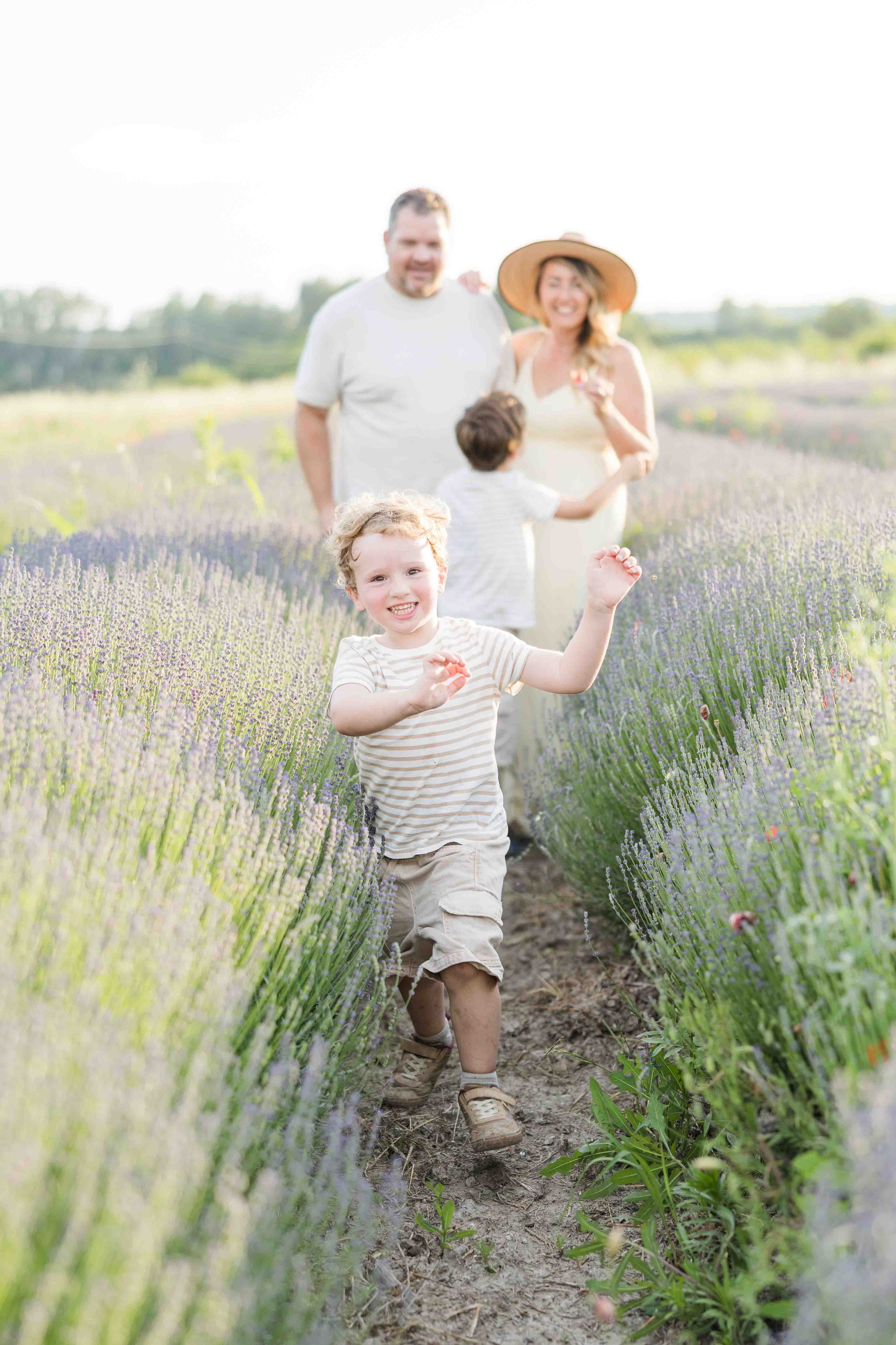 Child Running Through Lavender Fields in Provence