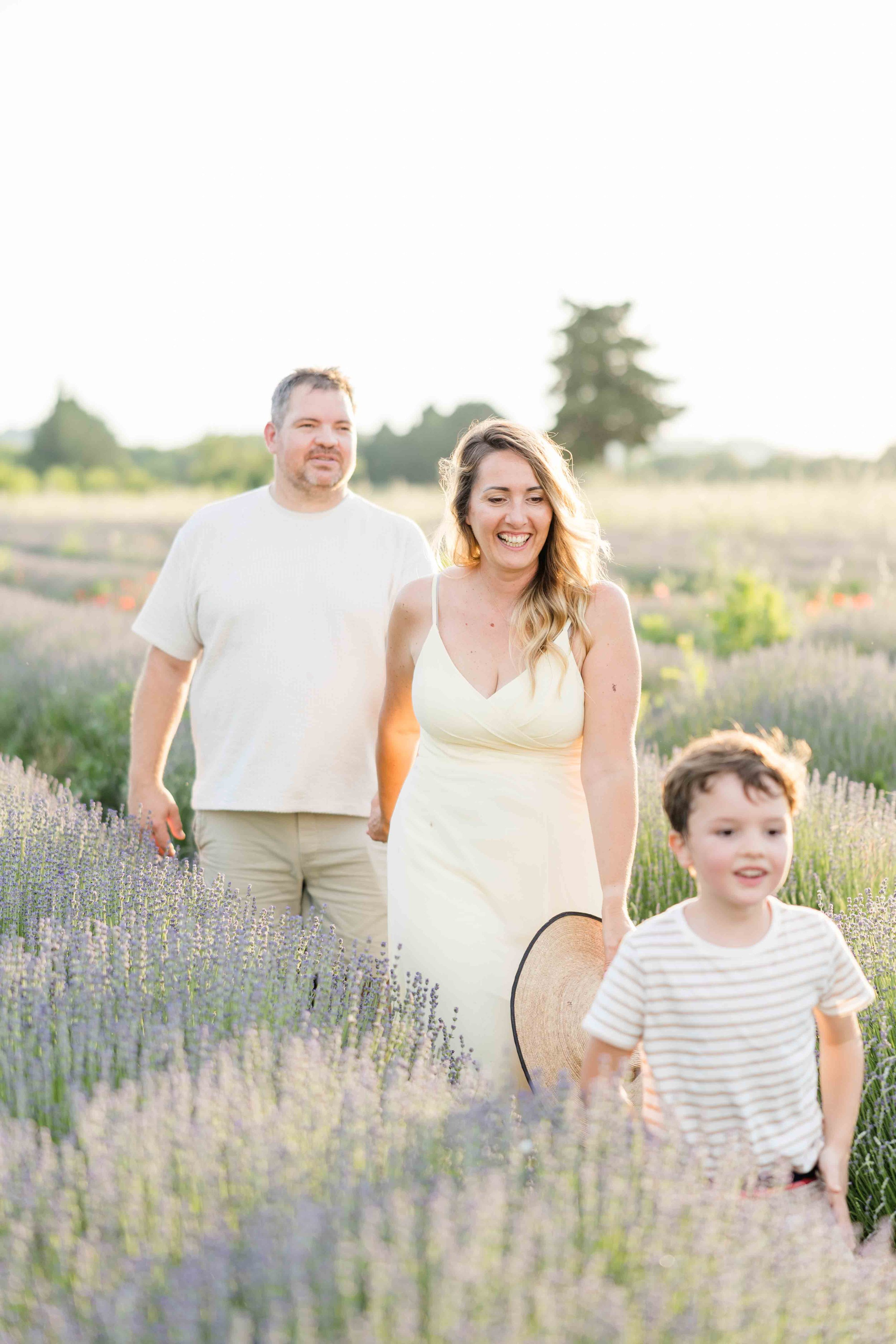 lifestyle-family-walking-together-lavender-field