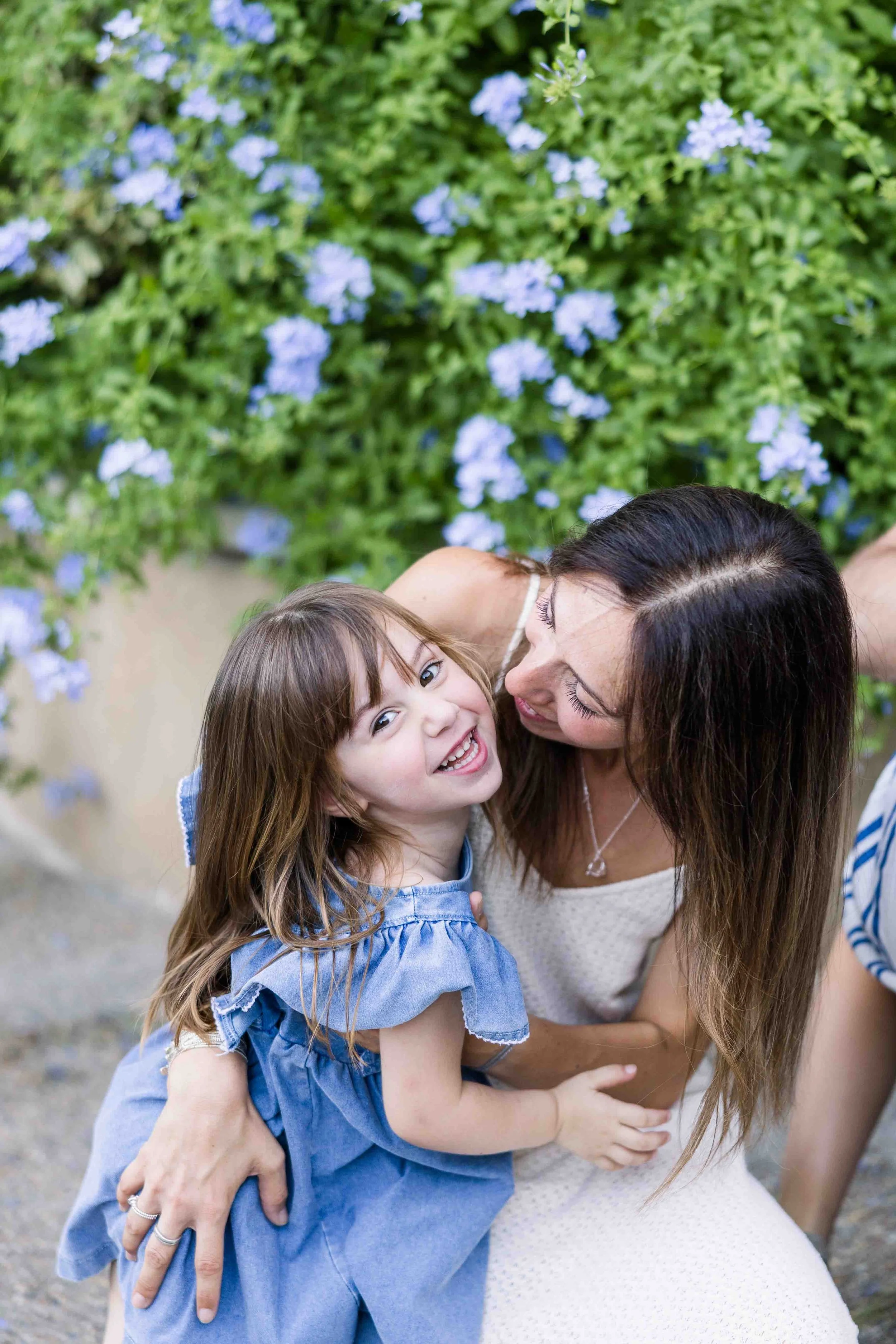 Mother and Daughter Cuddle in Provence