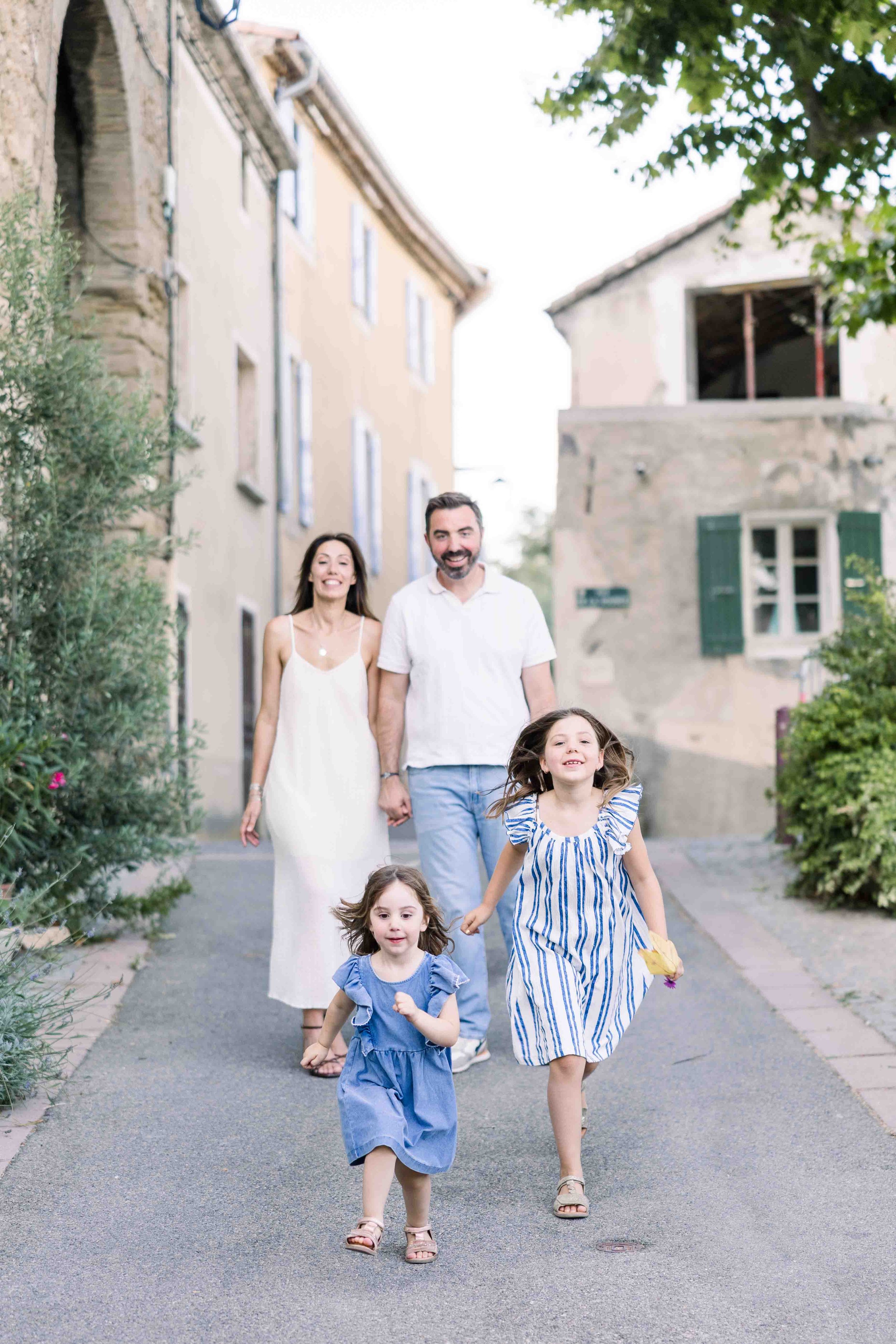 Joyful Family Walk in a Provençal Village