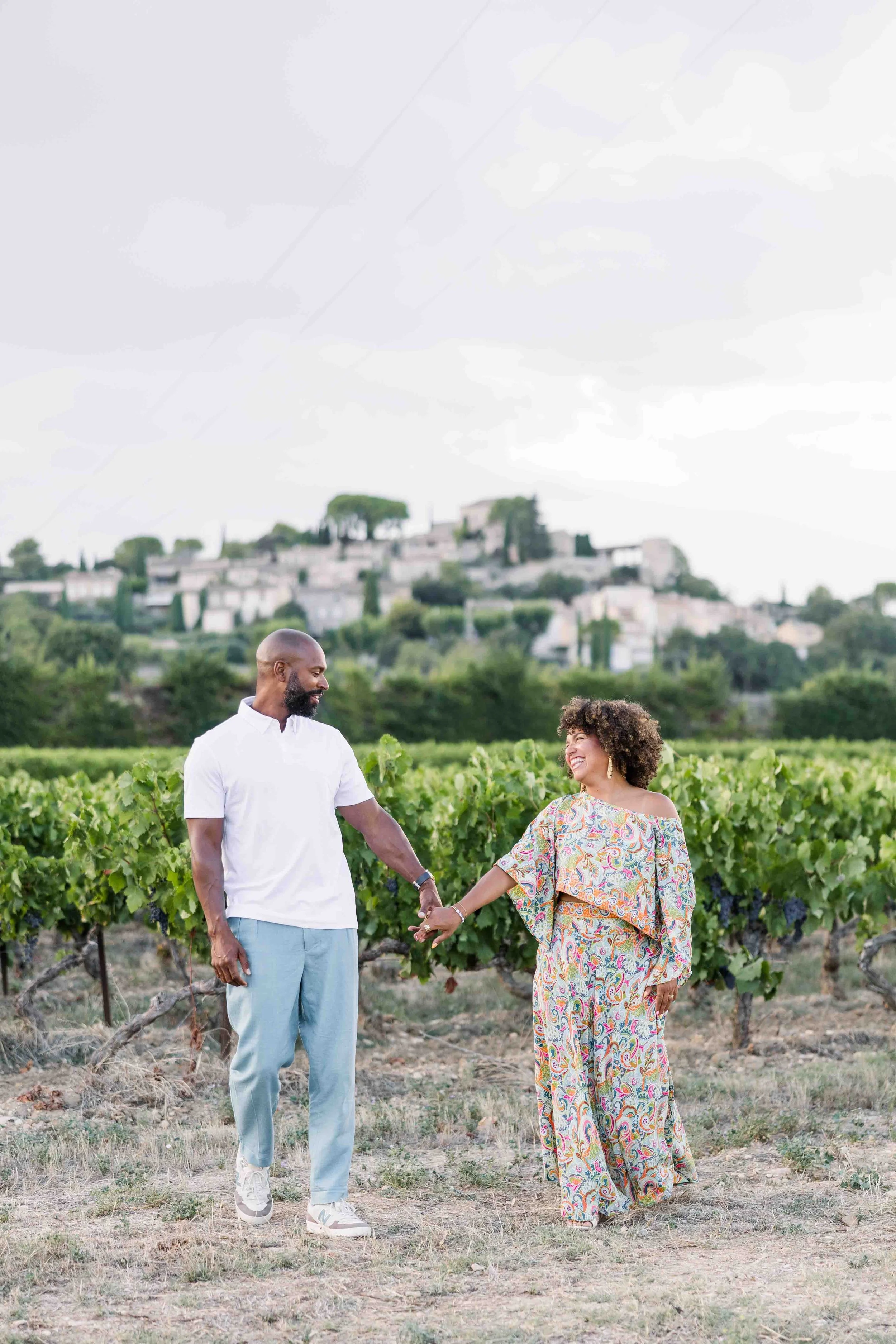 Parents Walking Through the Vineyards