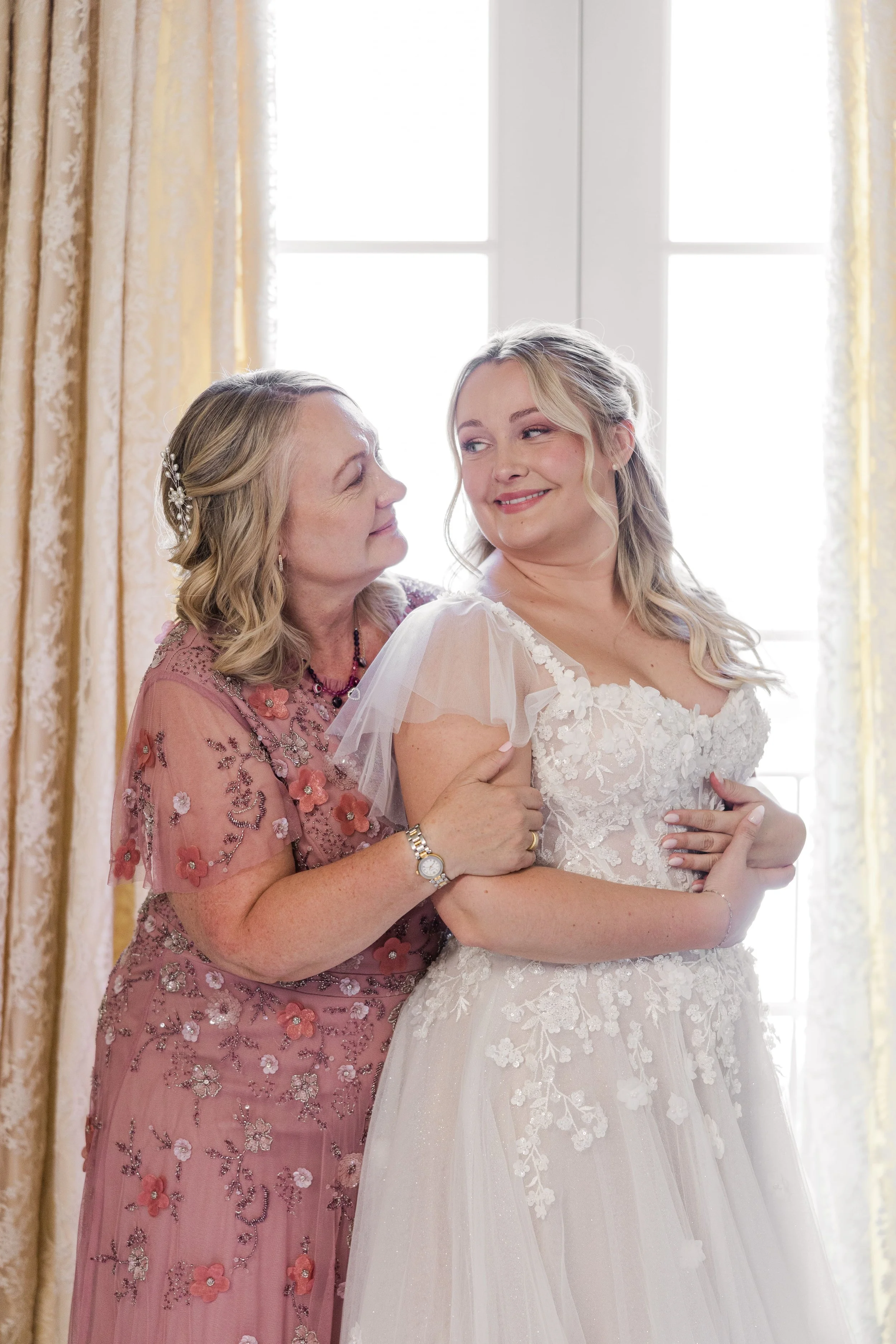 mom hugging her daughter just after getting dressed in Provence