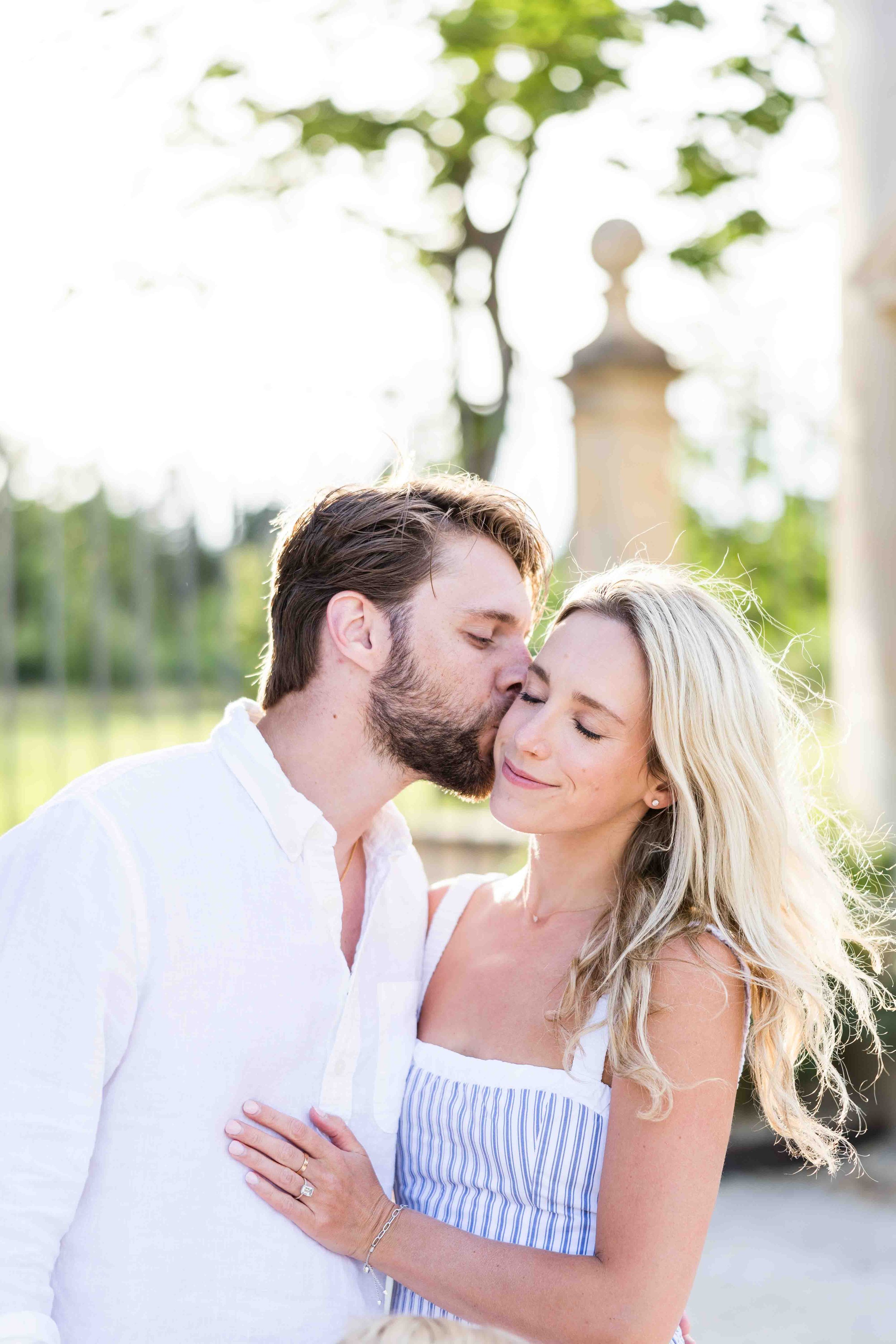 Intimate couple moment during a family session at Château de Fonscolombe, Provence.