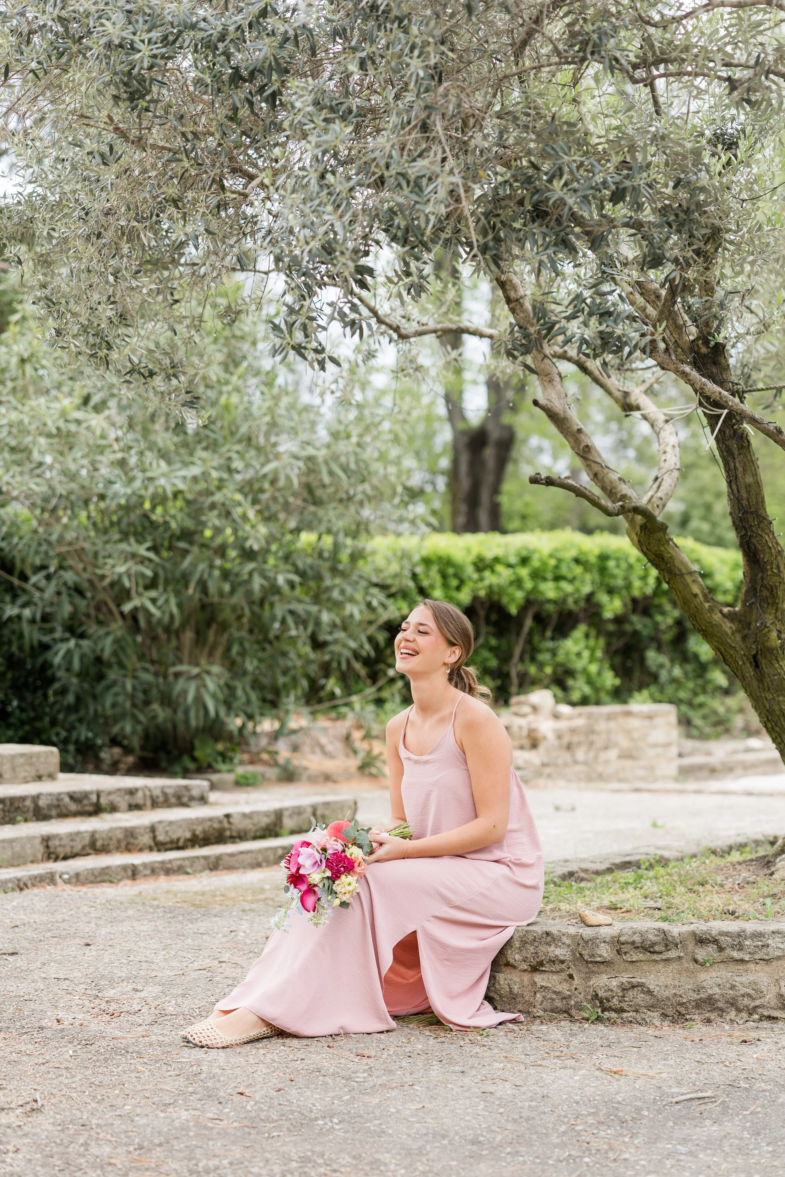 Candid portrait of a woman in the warm light of Provence countryside