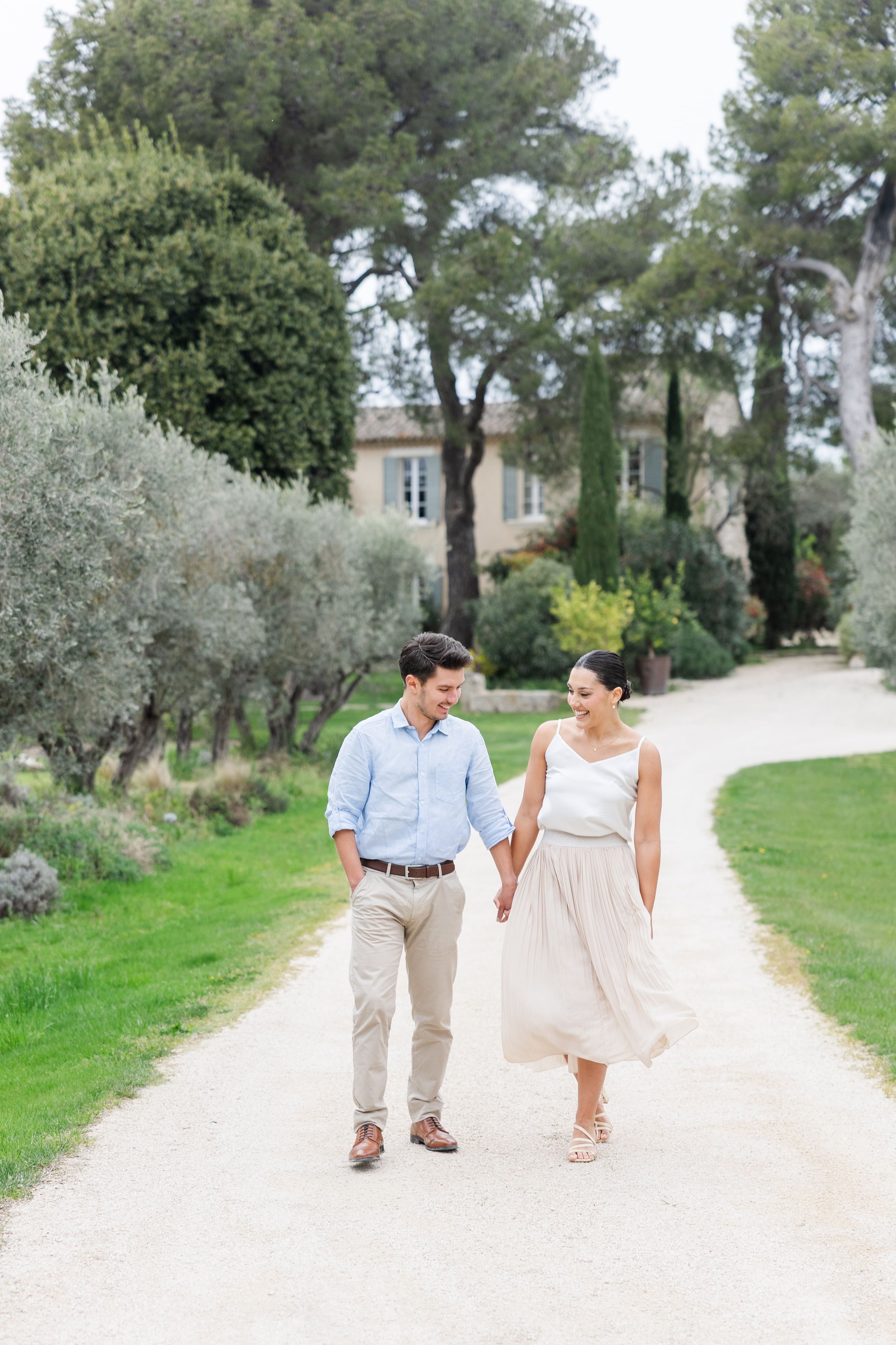 Elegant engagement portrait of couple in a dreamy Provence landscape