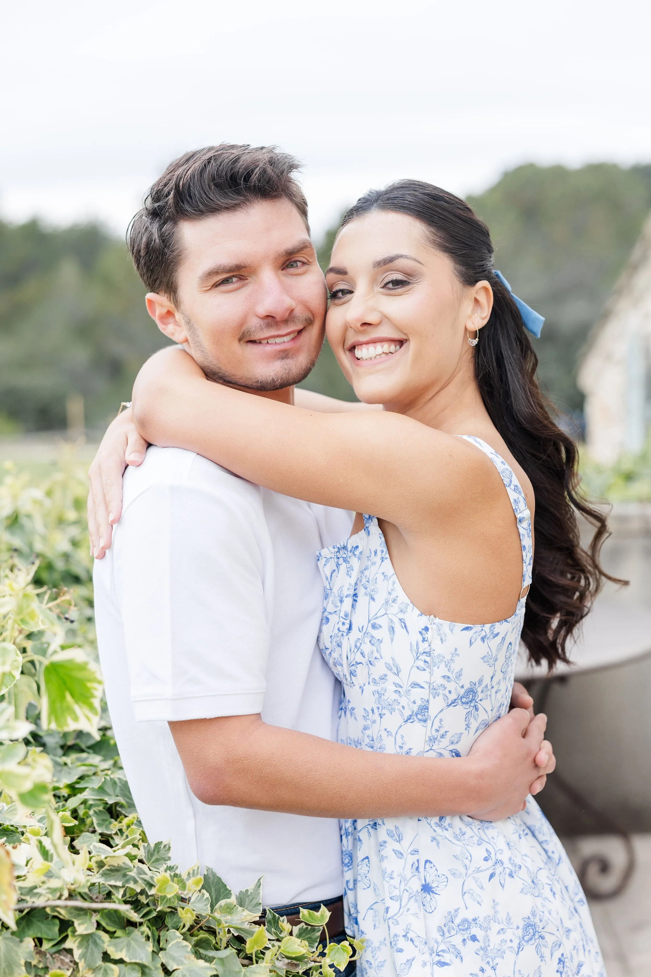 Love-filled engagement portrait of couple in rural Provence scenery