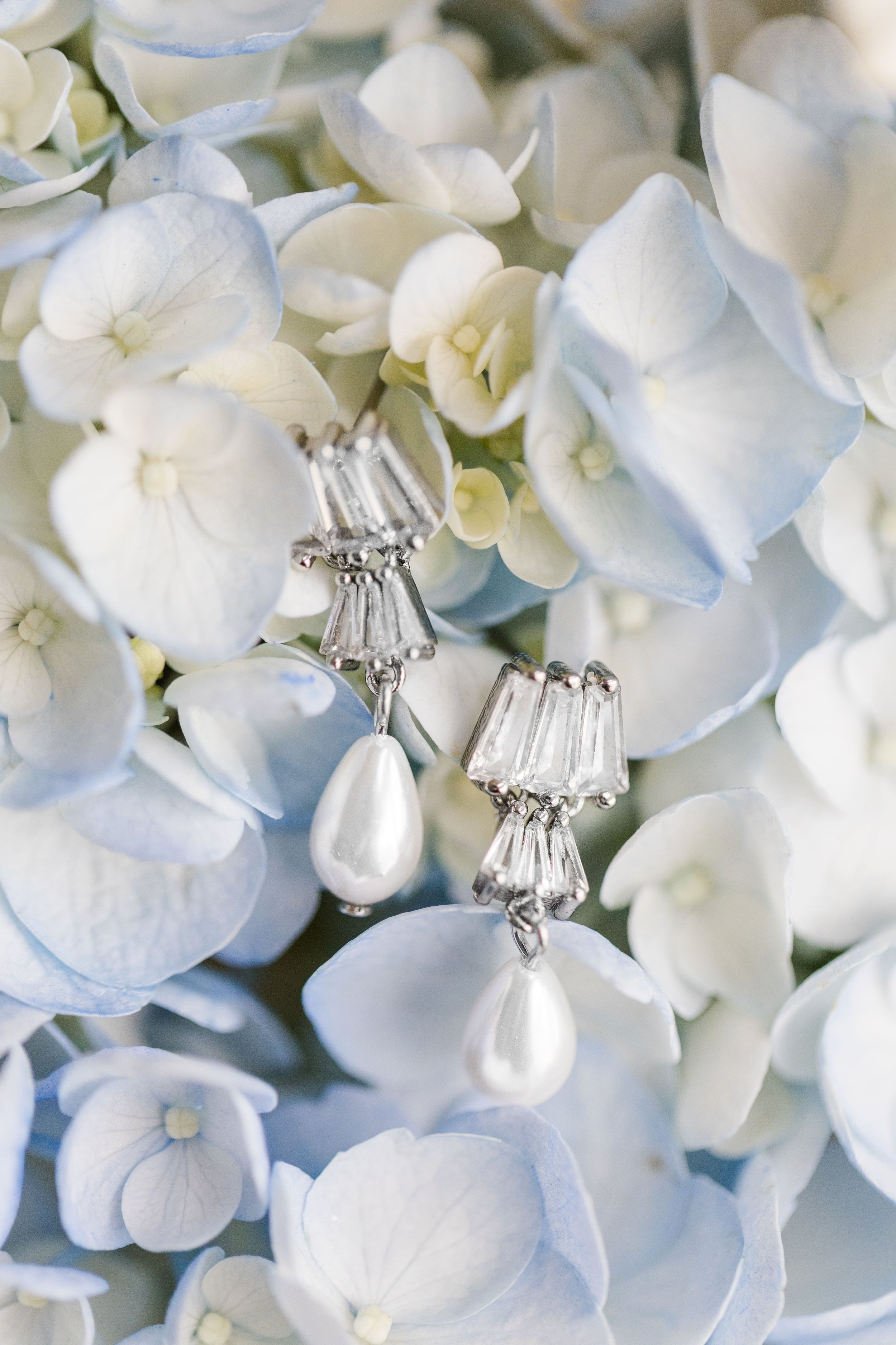 close up of the earings in the flowers