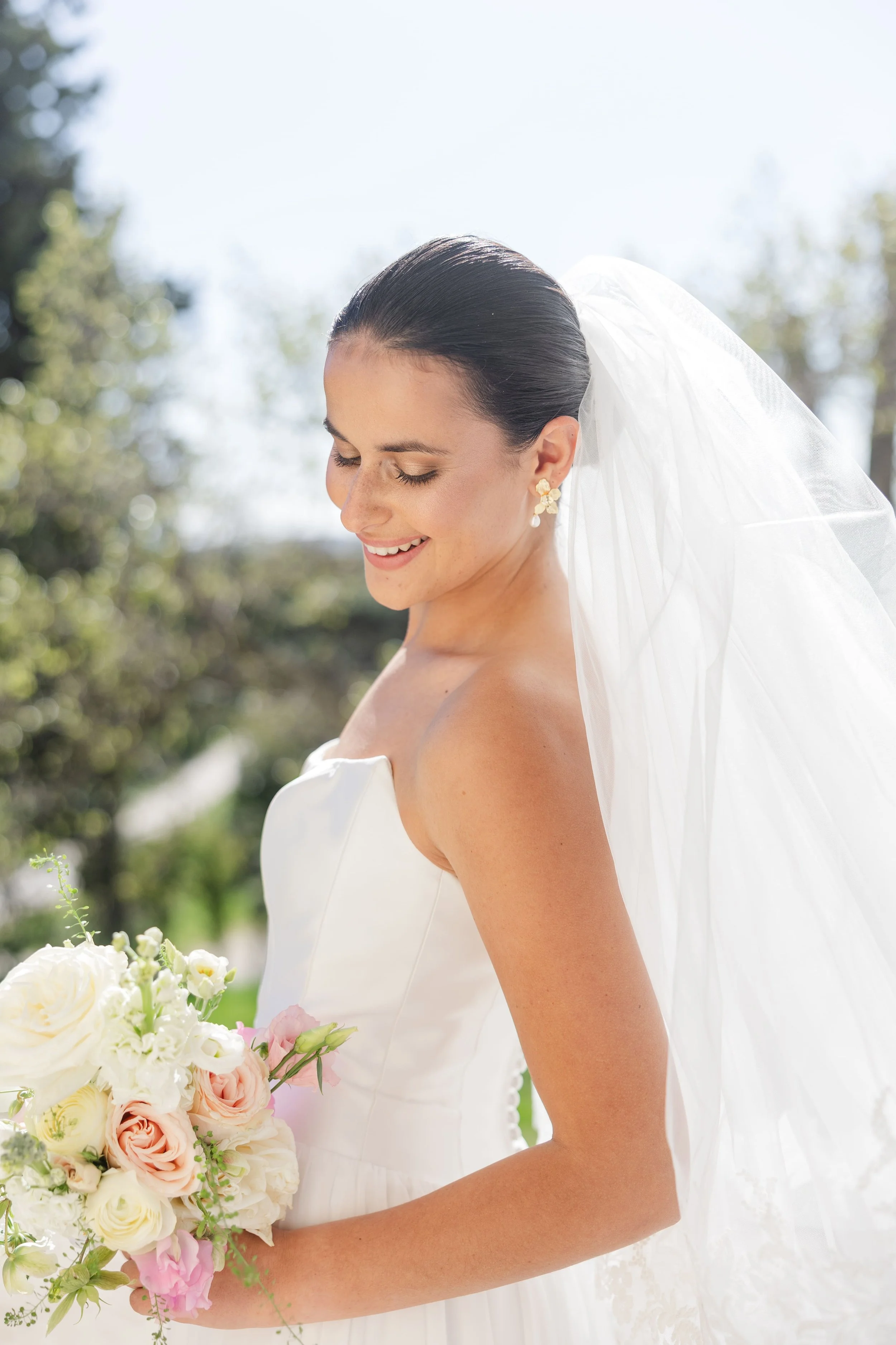 Elegant bride posing for a fine art wedding photography portrait