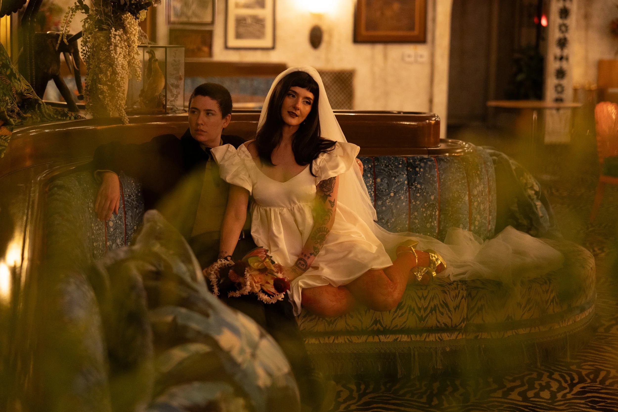 Native couple eloping in Glacier National Park with mountains in the background
