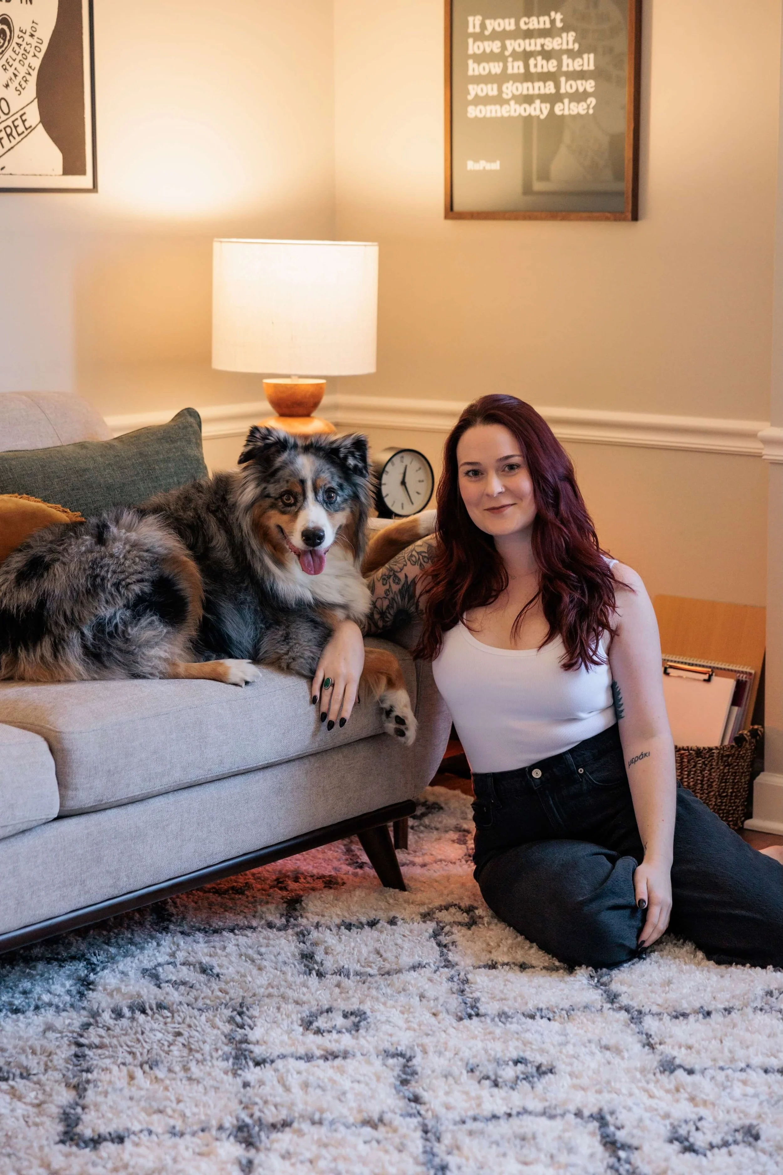Kaylie sits with her Australian Shepherd