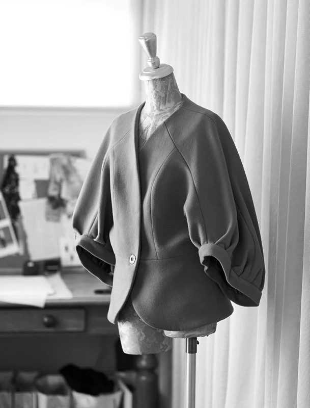 Wool cashmere balloon sleeved jacket in studio.jpeg