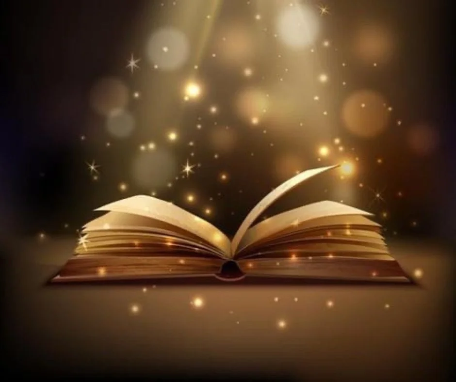 An open book with pages glowing golden, surrounded by floating golden sparkles and light orbs, creating a magical and enchanting atmosphere.