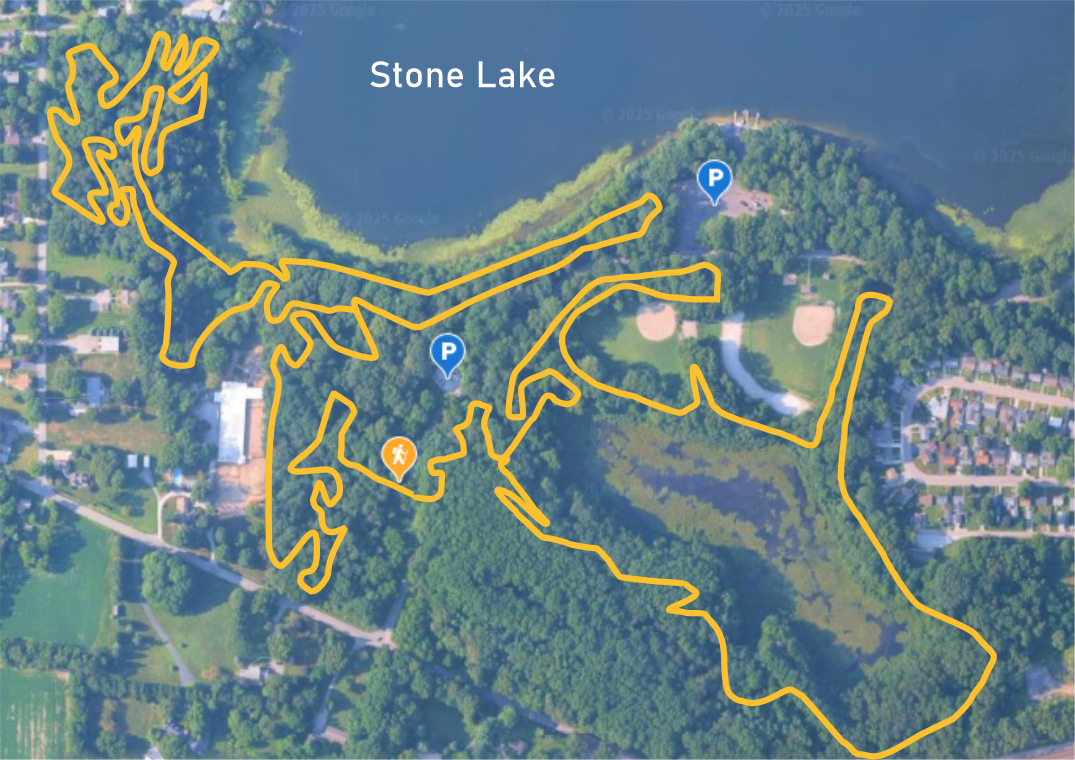 Satellite map of part of Soldier's Memorial Park with walking and biking trails outlined in yellow, parking areas marked with 'P', and a playground icon.