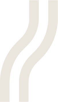 Close-up of a black and white striped fabric with wavy lines.