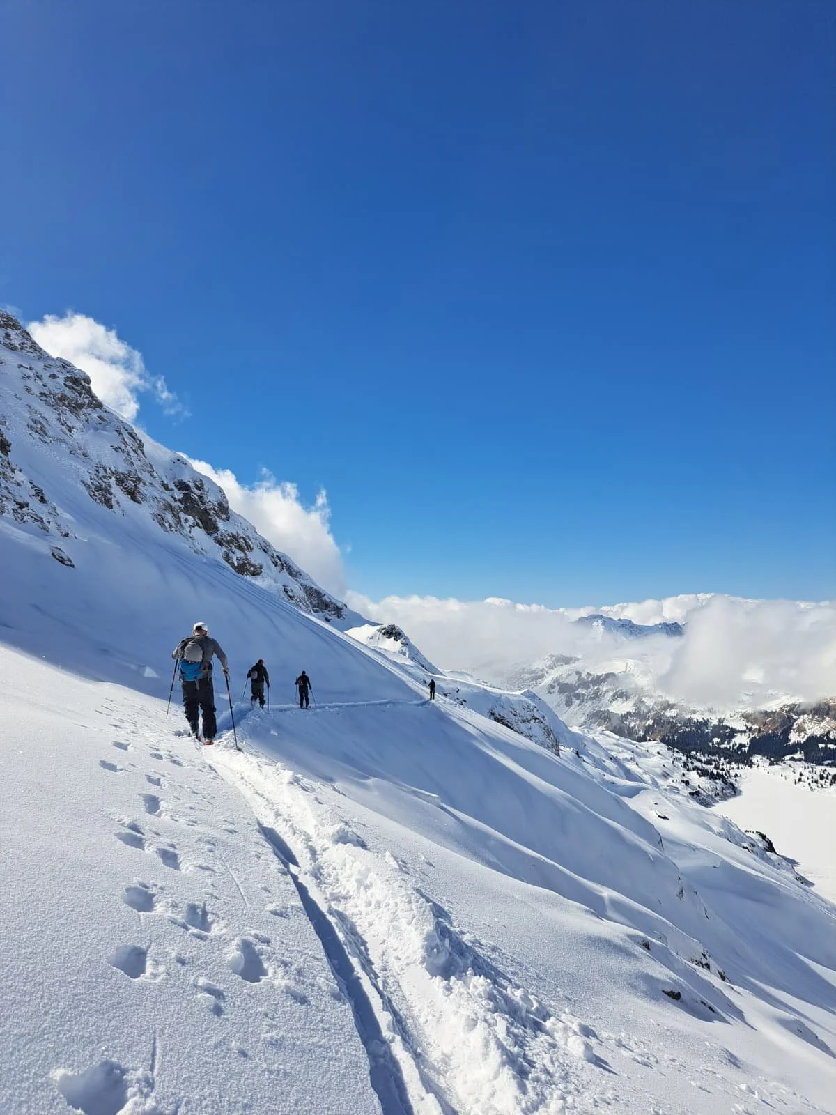 off piste ski guide and client ski touring in Engelberg