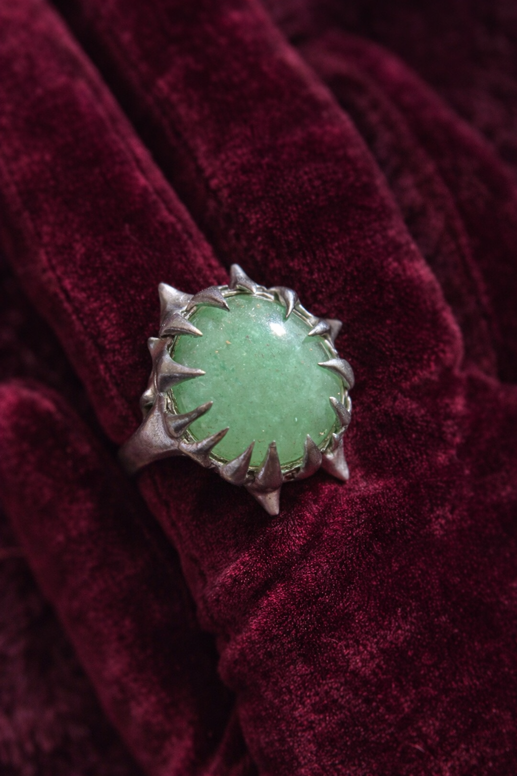 green claw ring from Necia
