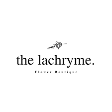 Logo of the Flower Boutique called The Lachryme, featuring a small branch above the text.