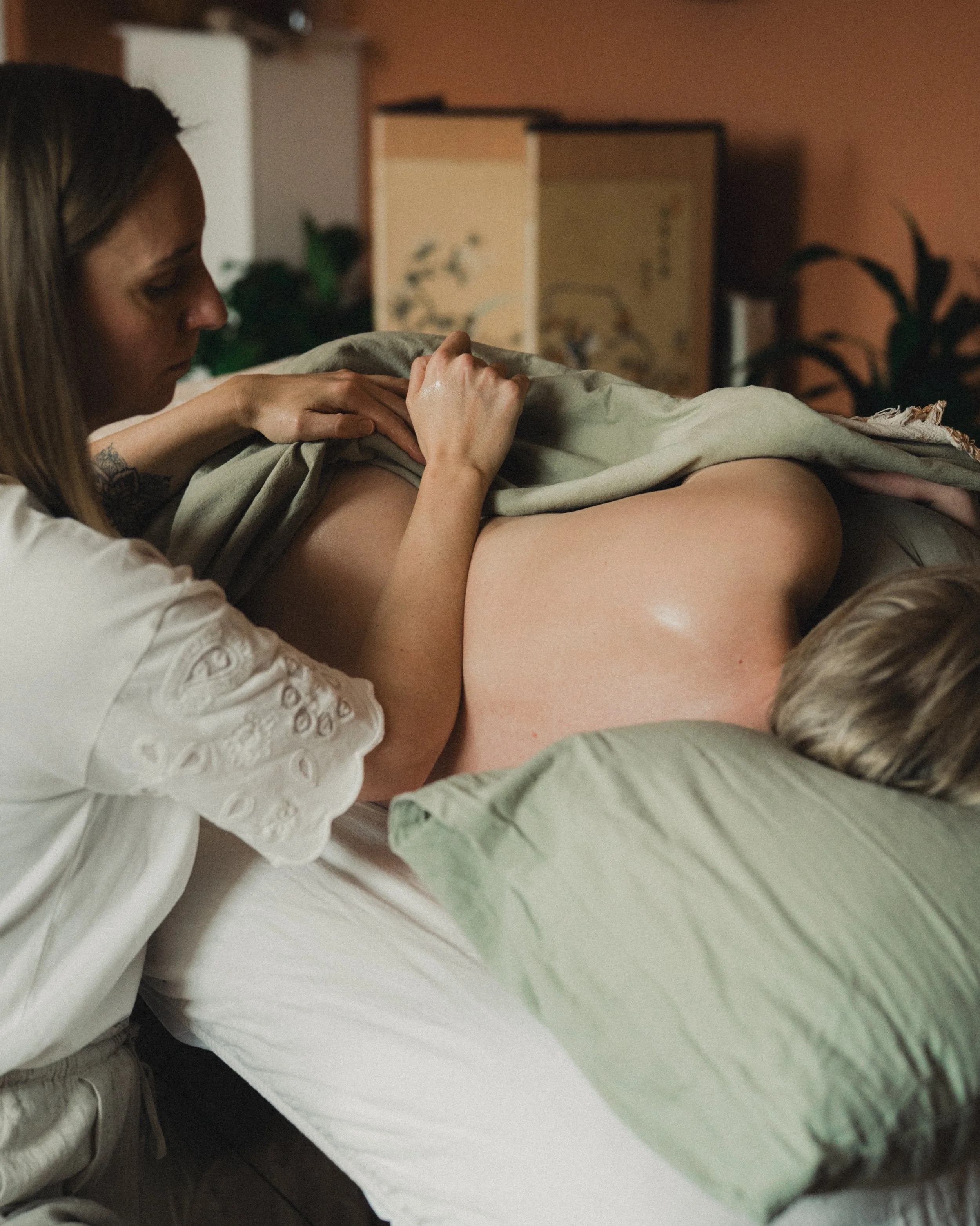 Side-lying pregnancy massage at Nook Massage & Wellness in Dunblane