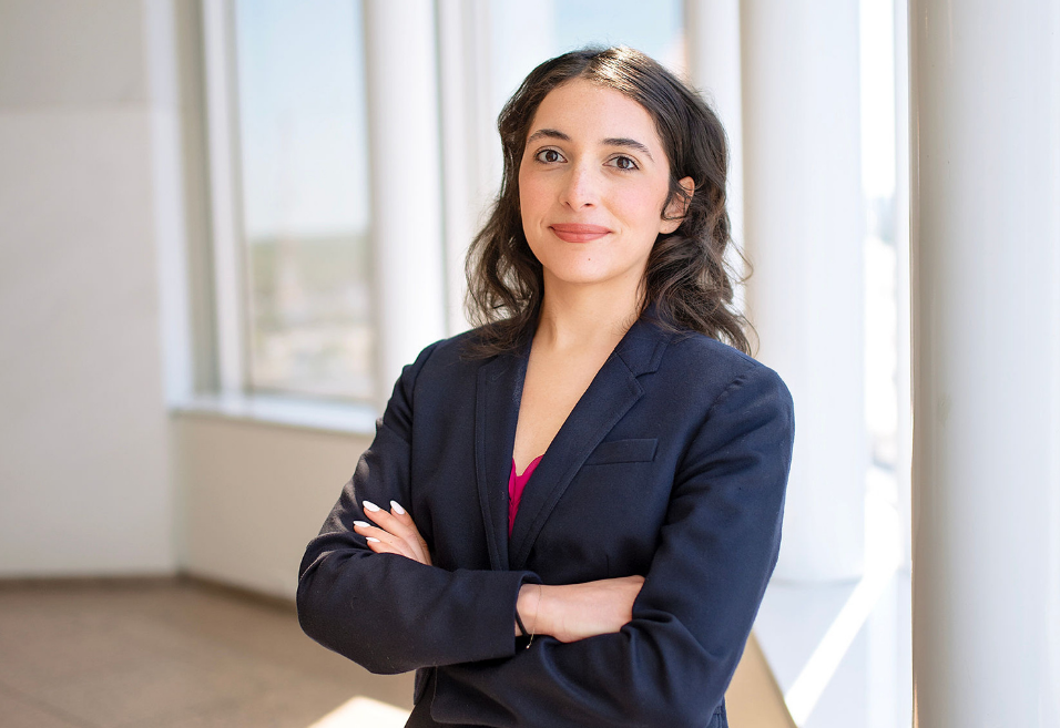 Silhouette of a person's head and shoulders, no details visible.