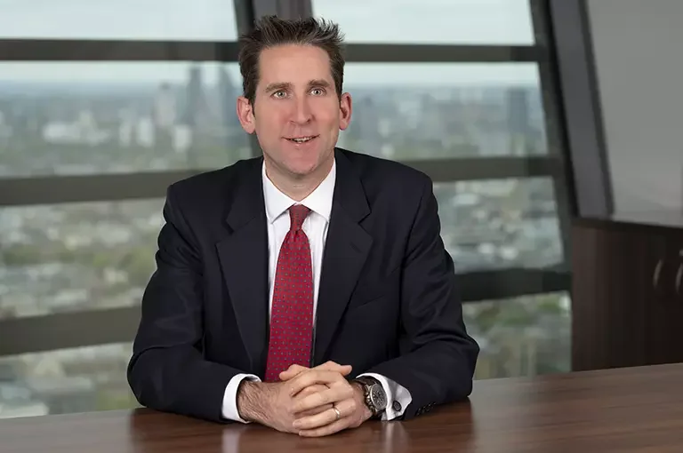 Silhouette of a woman with shoulder-length hair against a white background.