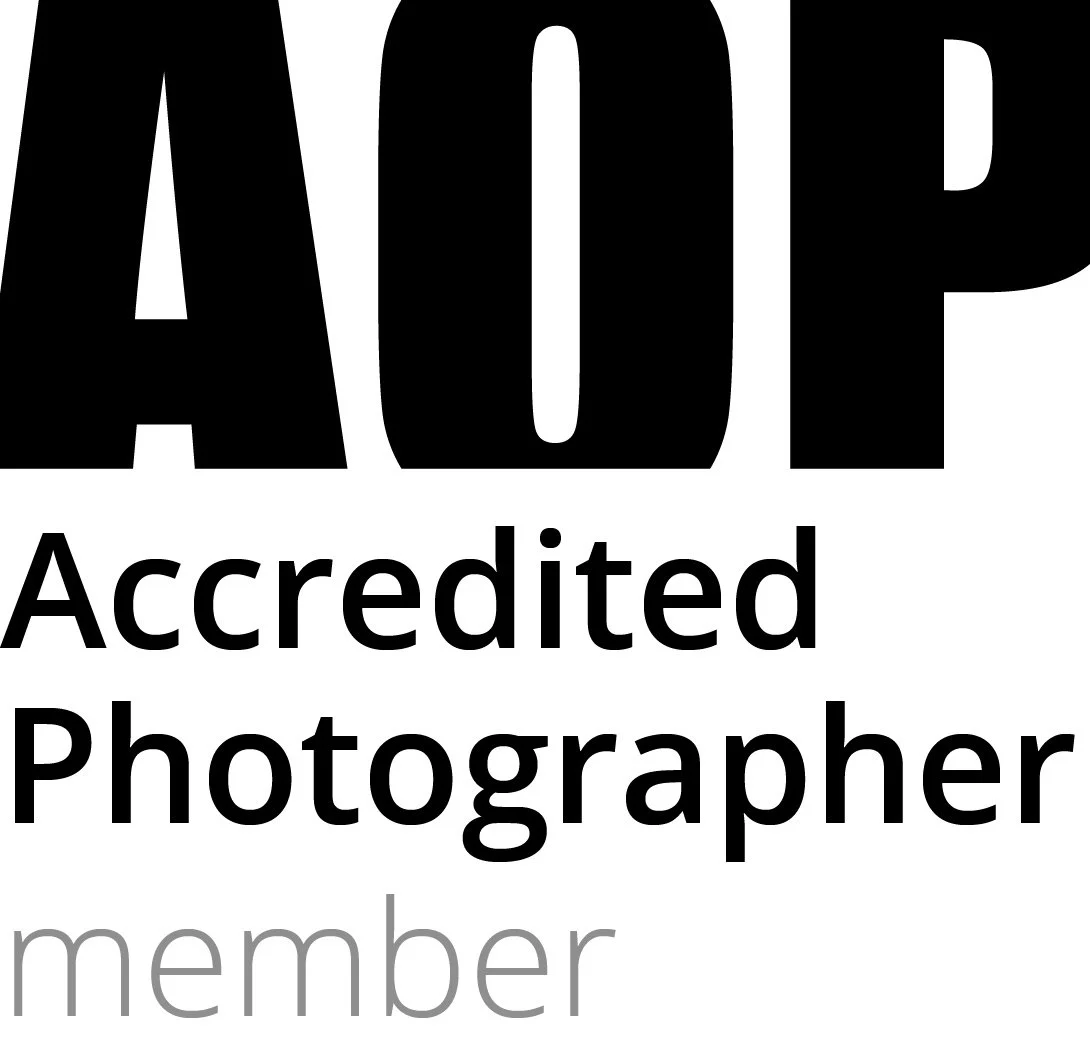 A black and white logo with the word "AOP" in large bold letters at the top, followed by "Accredited Photographer" in smaller text, and "member" in light gray at the bottom.