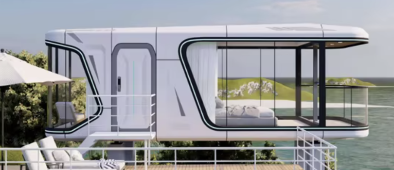 Modern houseboat with large glass windows and a balcony overlooking the water, surrounded by greenery.