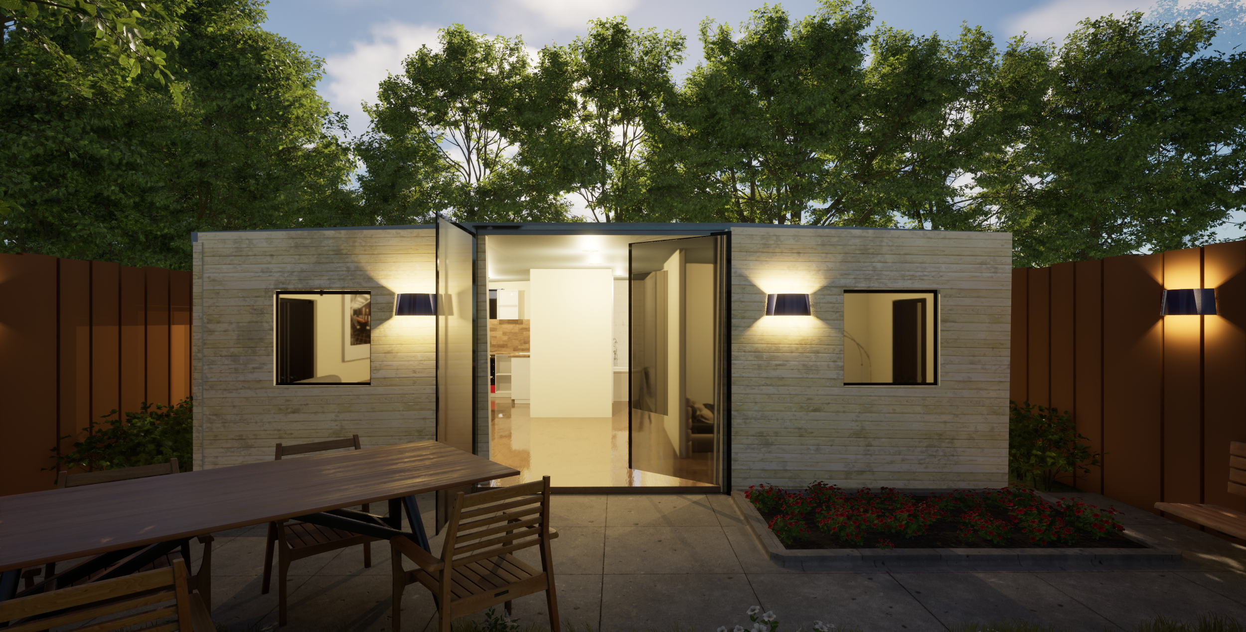 Exterior of a modern tiny house with open glass doors, two small windows, outdoor seating area with a wooden table and chairs, garden bed, and wall-mounted lights, set against a backdrop of tall green trees at dusk.