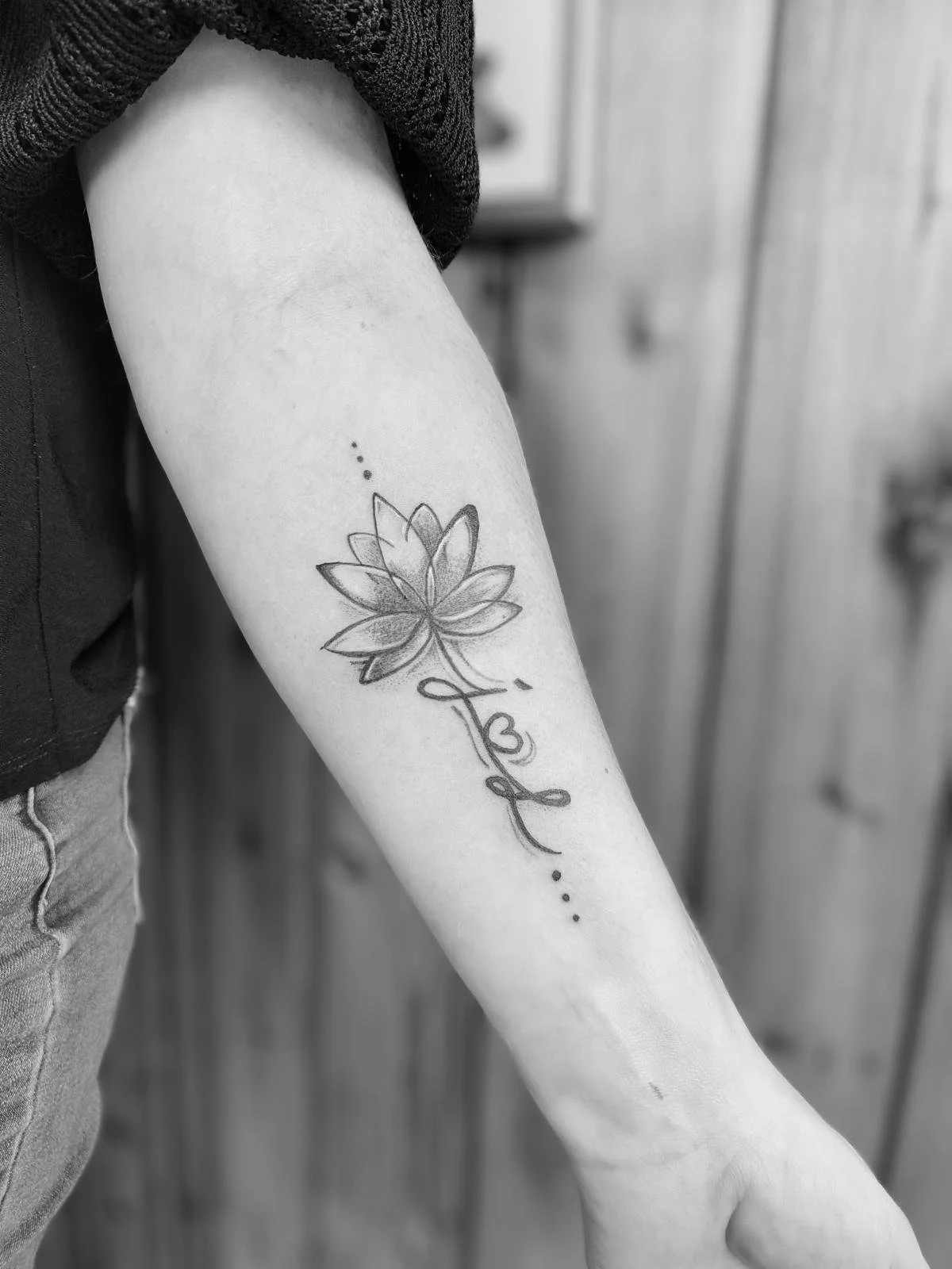 fineline lotus tattoo