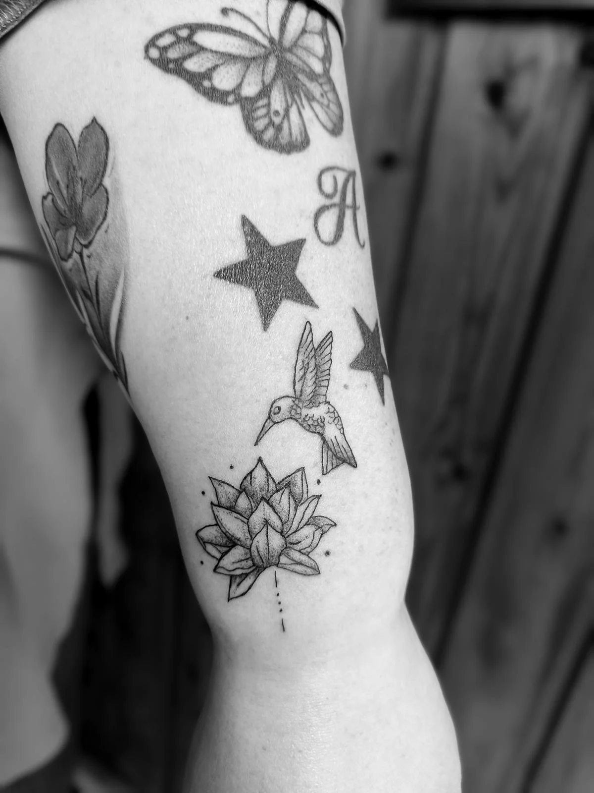fineline kolibri lotus flower tattoo