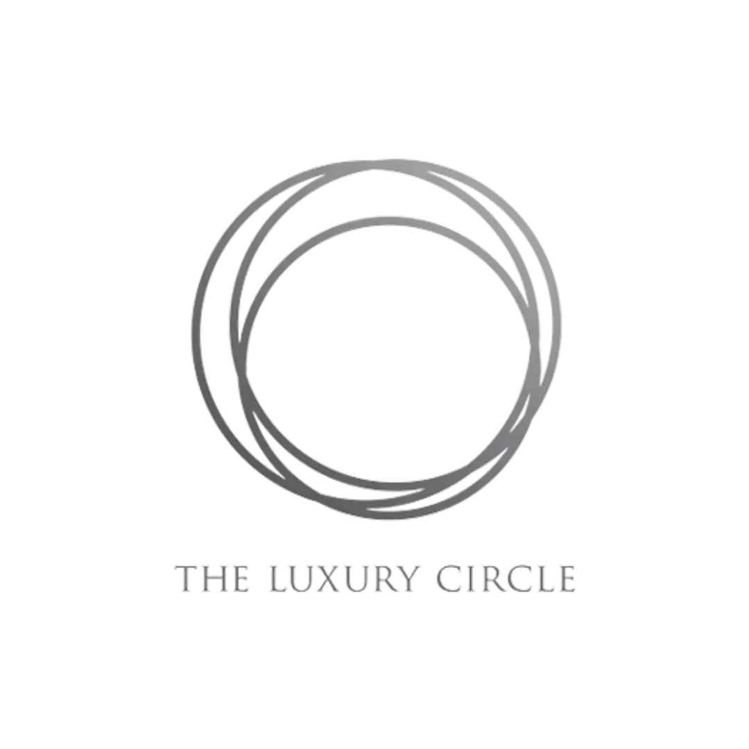 The Luxury Circle logo with three overlapping circles above the text THE LUXURY CIRCLE. Exclusive luxury hotel program offering VIP perks, upgrades, and personalized travel benefits.