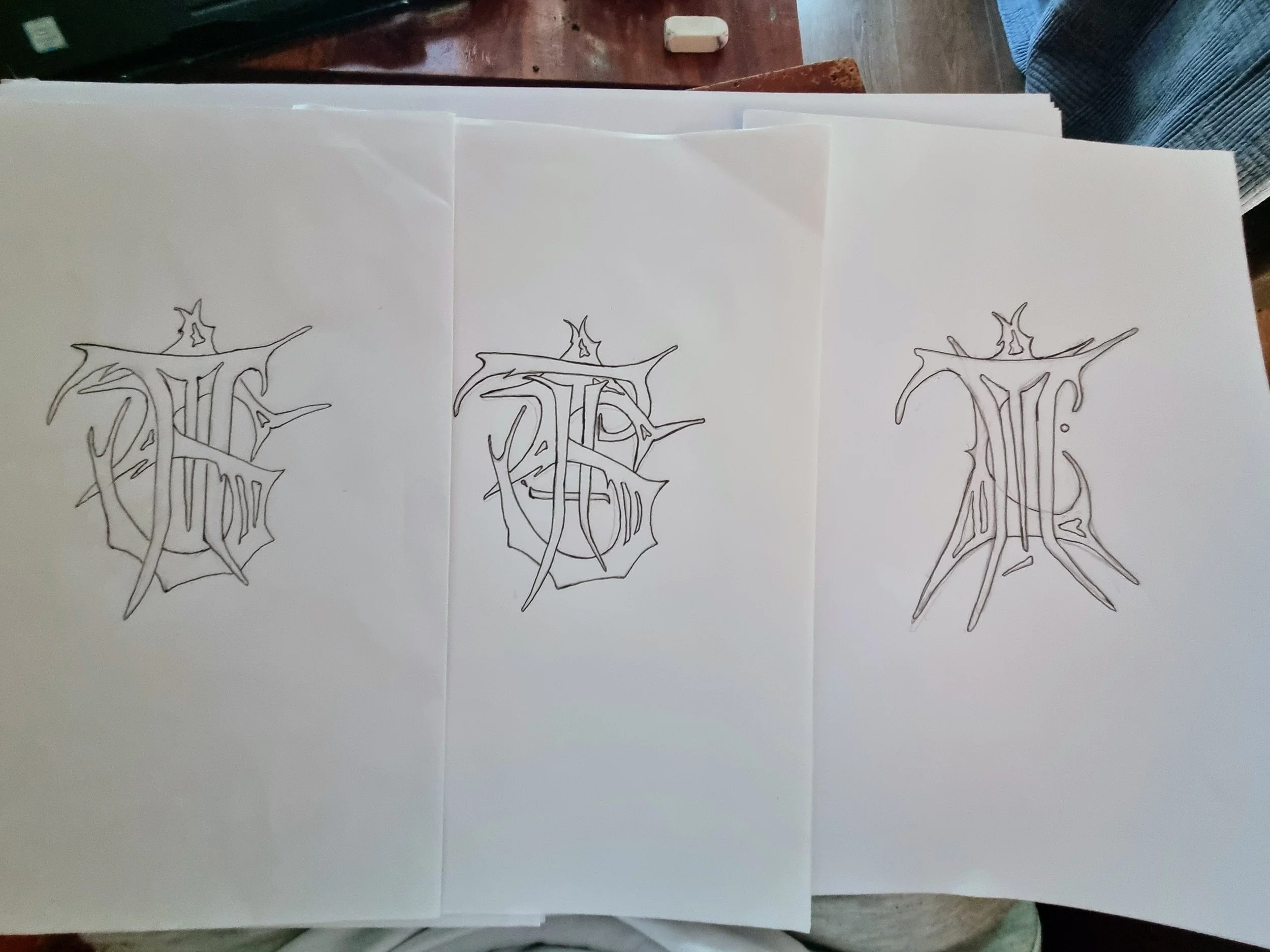 Pen Drawings of the Three Logos