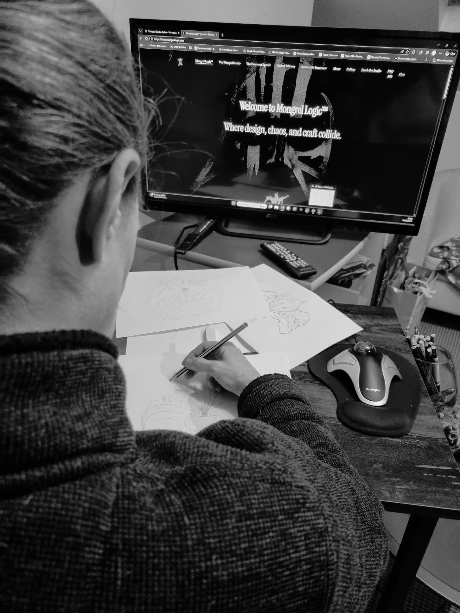 Founder at desk drawing Lilith's Corsage