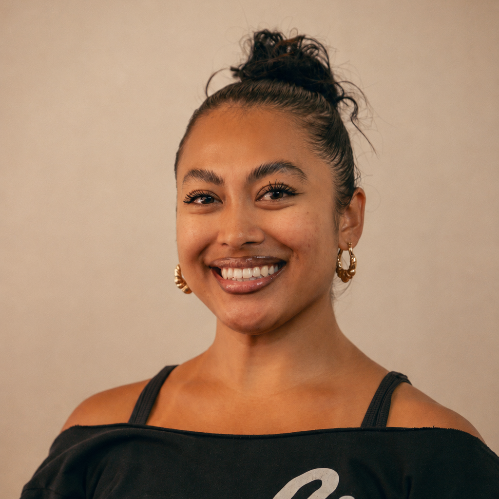 A young woman smiling, wearing a black shirt with the word 'melt' written on it.