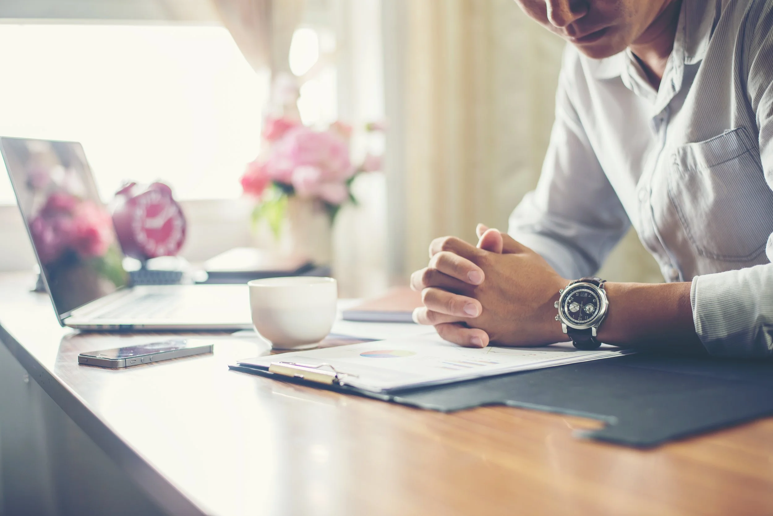 businessman-working-on-his-desk-with-a-cup-of-coff-2026-01-07-00-56-47-utc.jpg