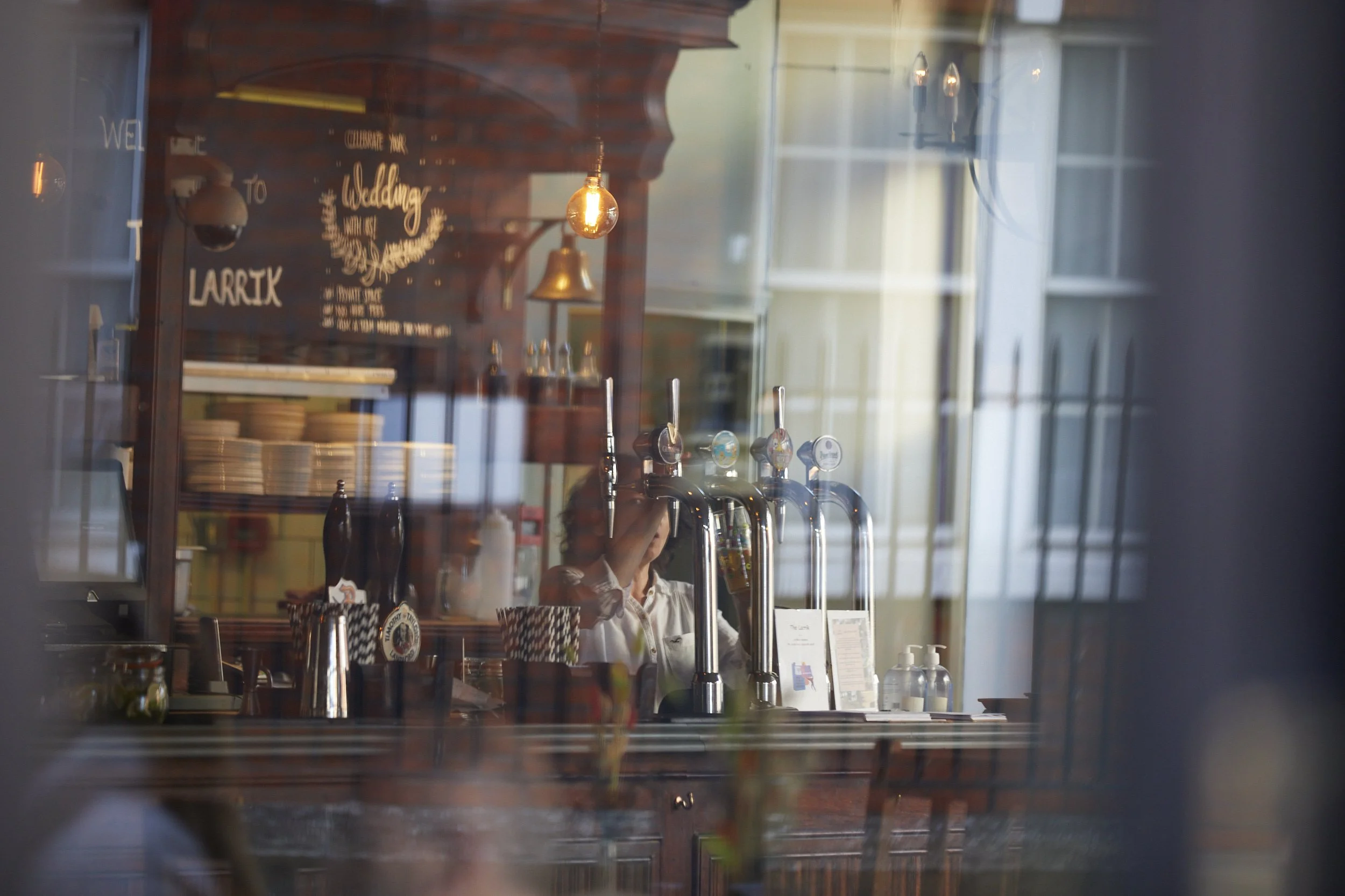 larrik bartender serving.jpg