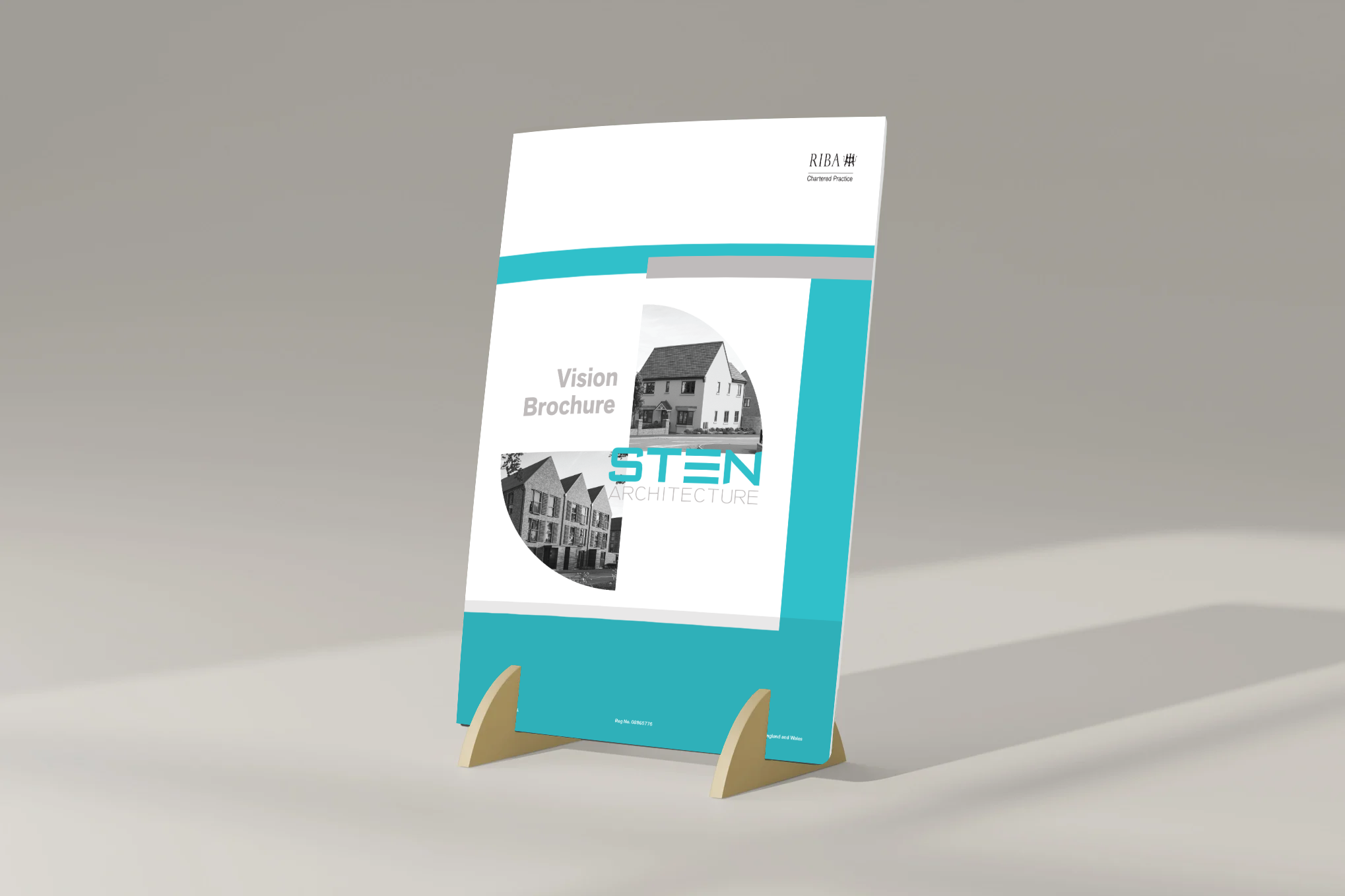 Brochure stand displaying a vision brochure for STEN Architecture with images of houses and architectural designs.