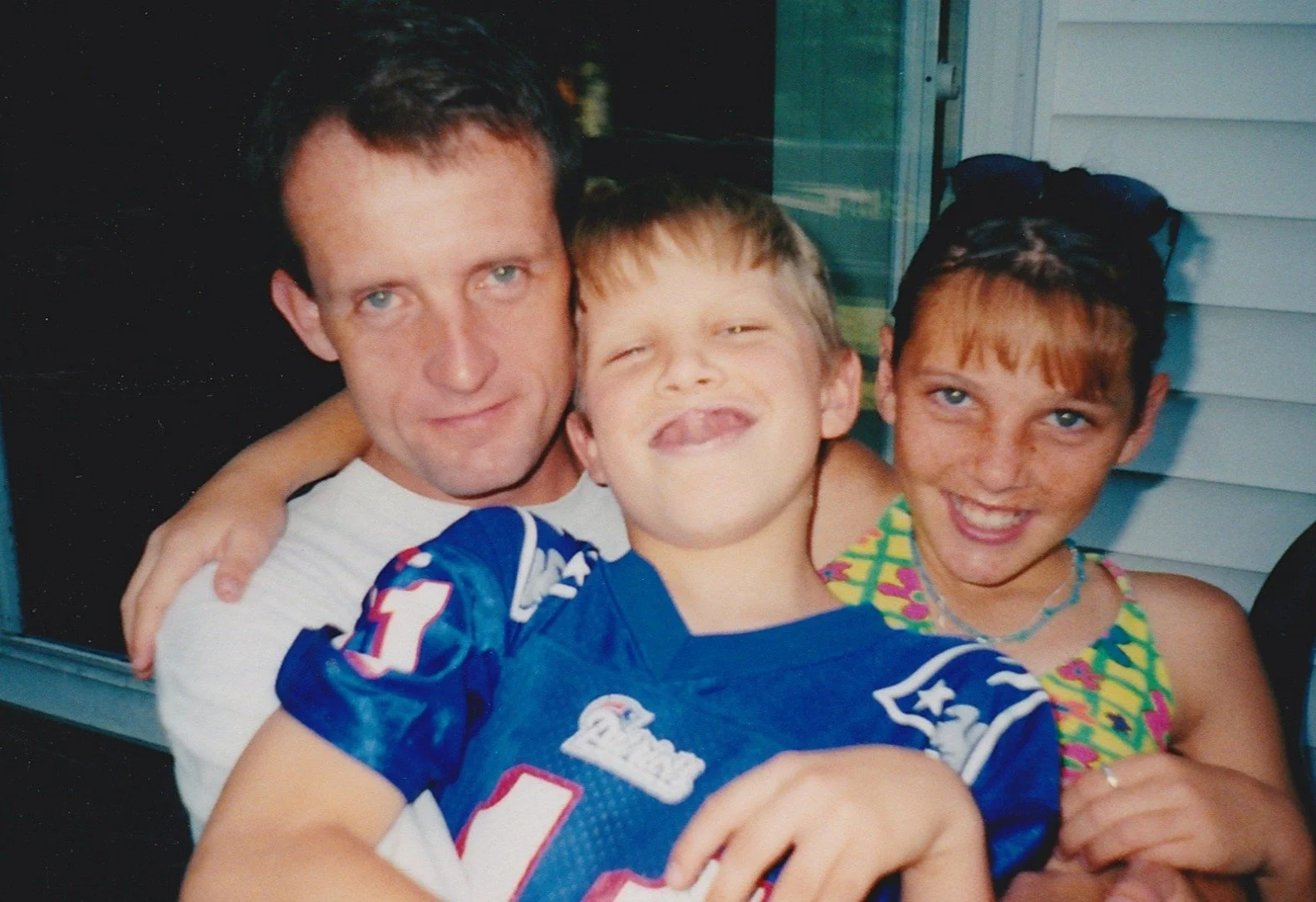 Bill with kids on back deck