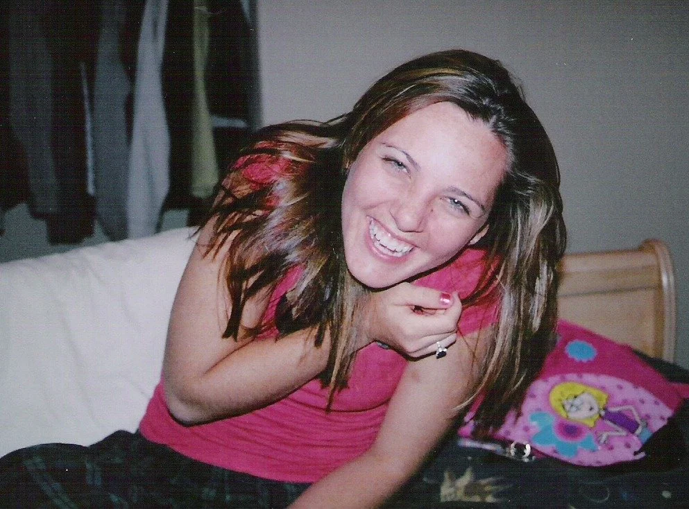 Tiare laughing in Dacotah's room