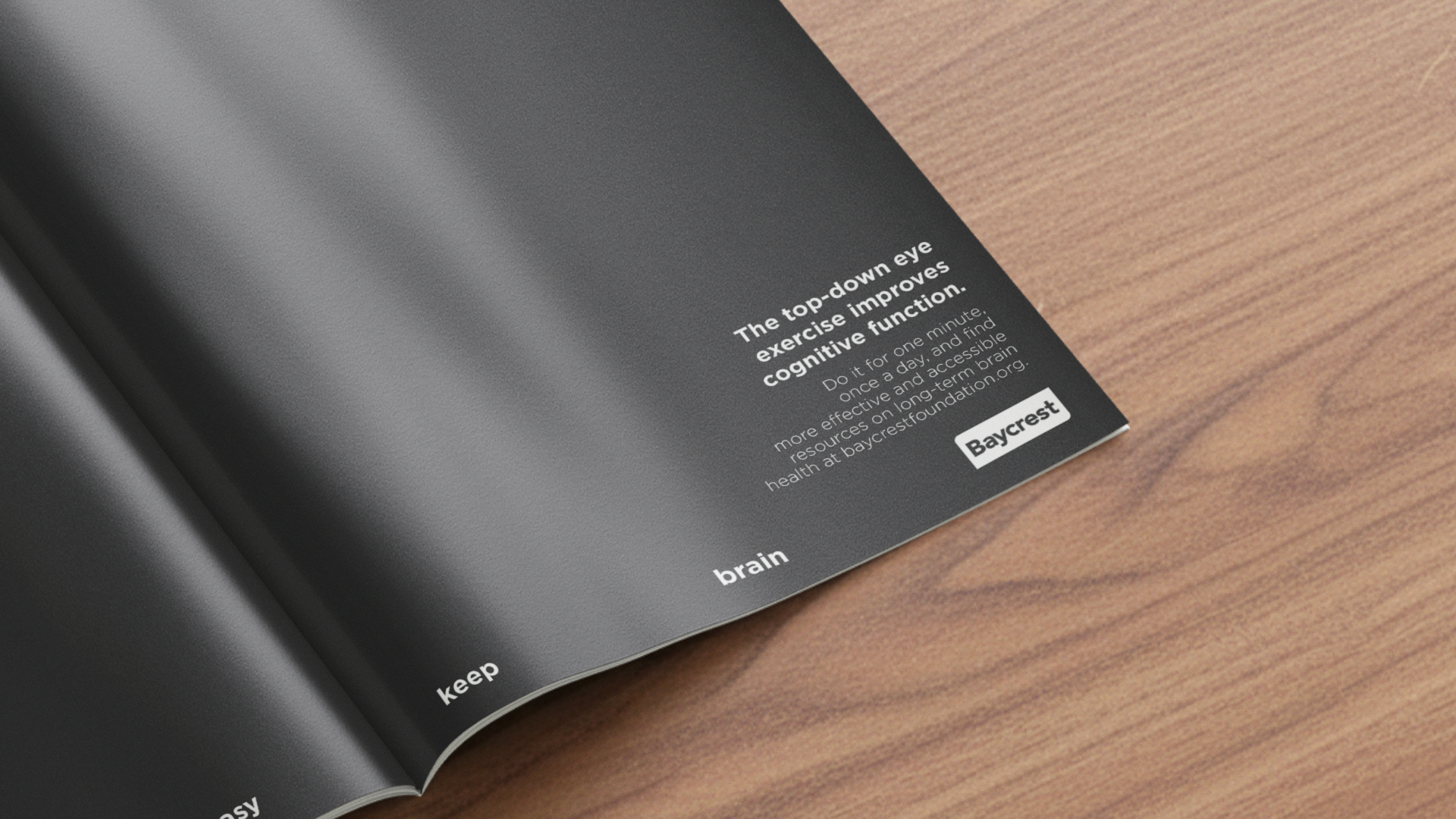 Une page d'un livre ou brochure avec un fond noir et du texte en anglais. Le texte parle d'un exercice pour améliorer la fonction cognitive en exercant les yeux, avec la mention 'keep brain'. Le logo 'Baycrest' est visible en bas de la page.