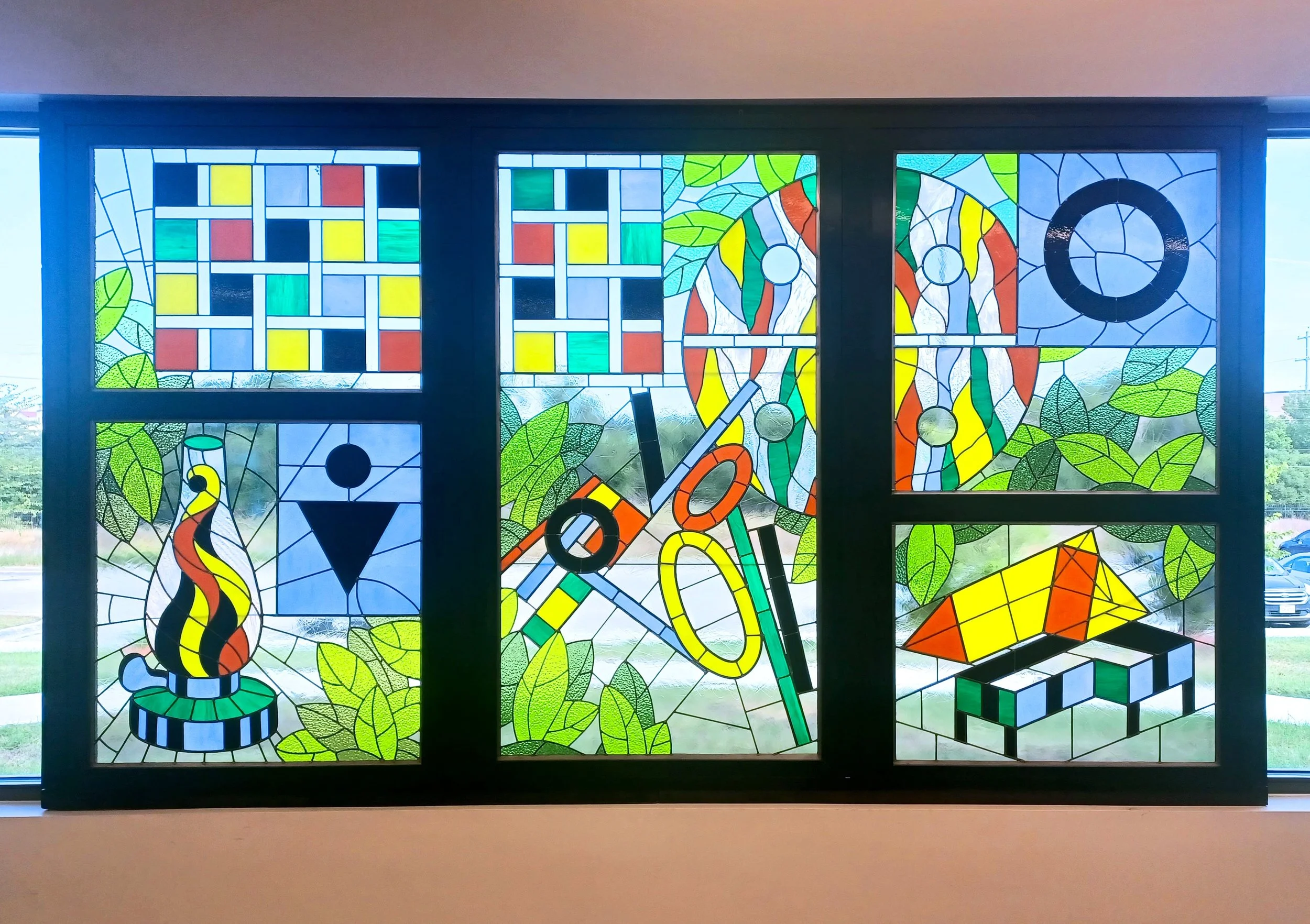 Stained glass tri-panel public art commissioned by San Marcos Arts Commission honoring artist Bill Hutson installed in the San Marcos Public Library by Sondra Kretschmar