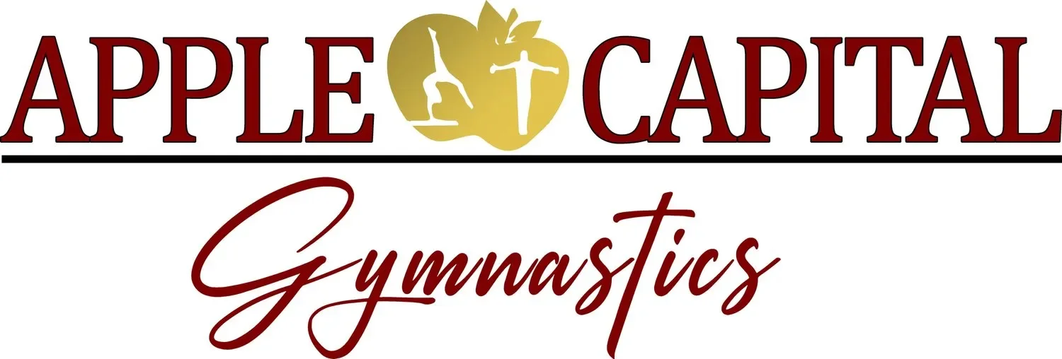 Logo for Apple Capital Gymnastics featuring the words 'Apple Capital' in large red letters with a gold apple in the center containing three white silhouettes of gymnasts performing different poses, and the word 'Gymnastics' in red cursive below.