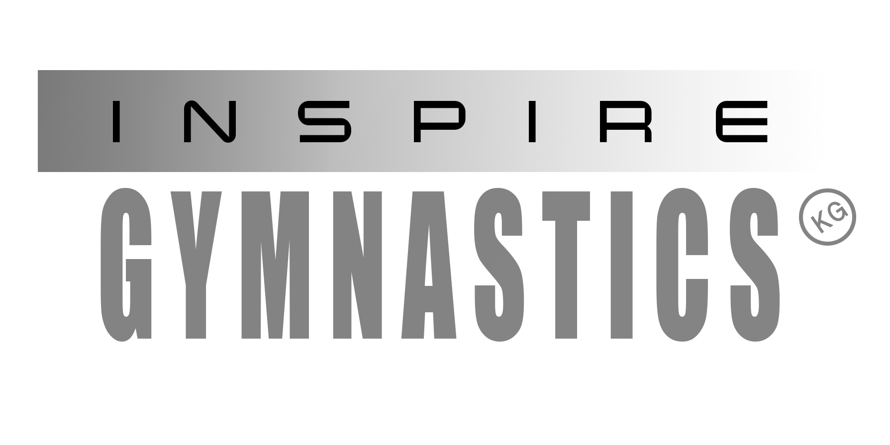 A dark background with a metallic rectangular sign reading 'INSPIRE' in bold black letters.